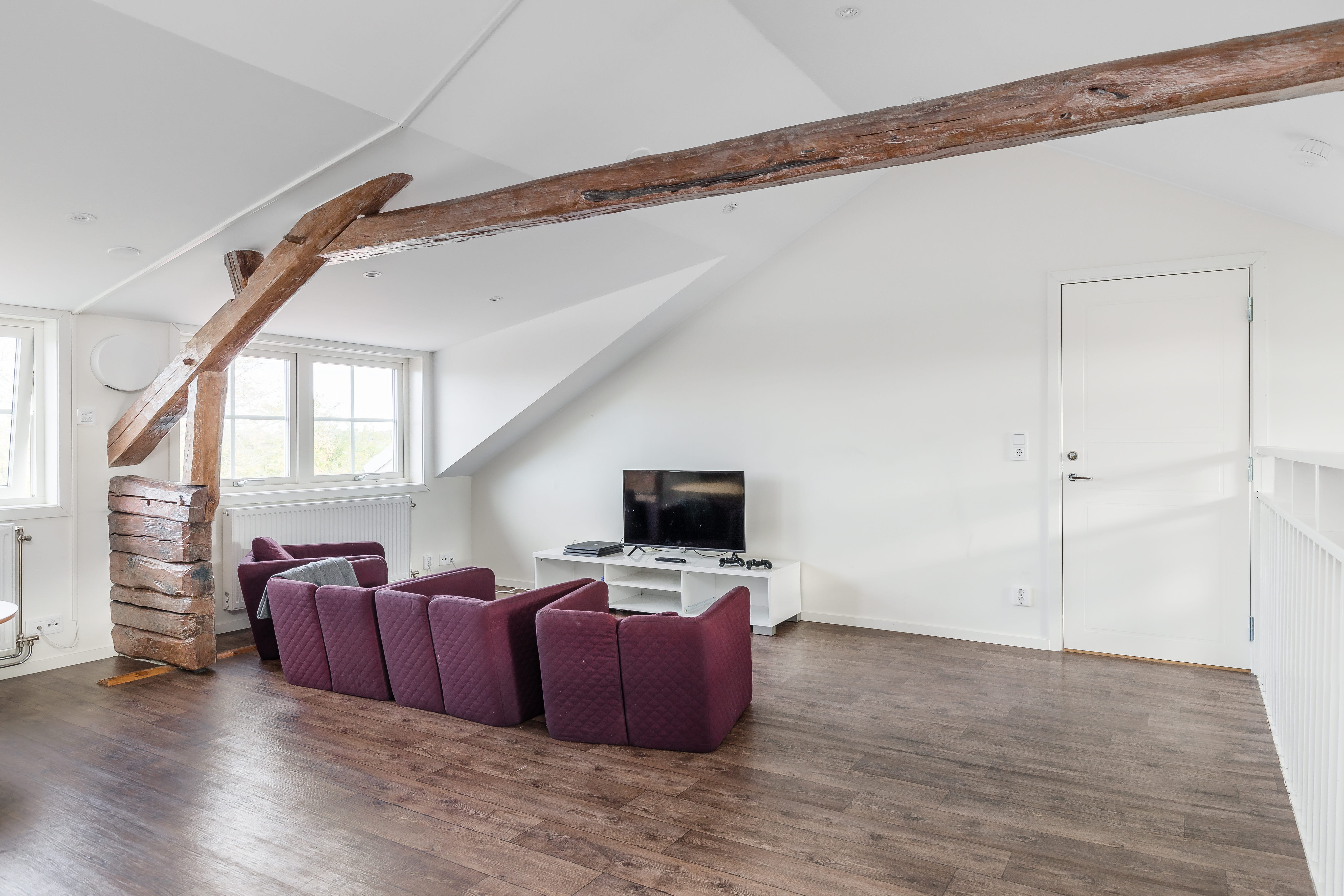 A room with a wooden floor