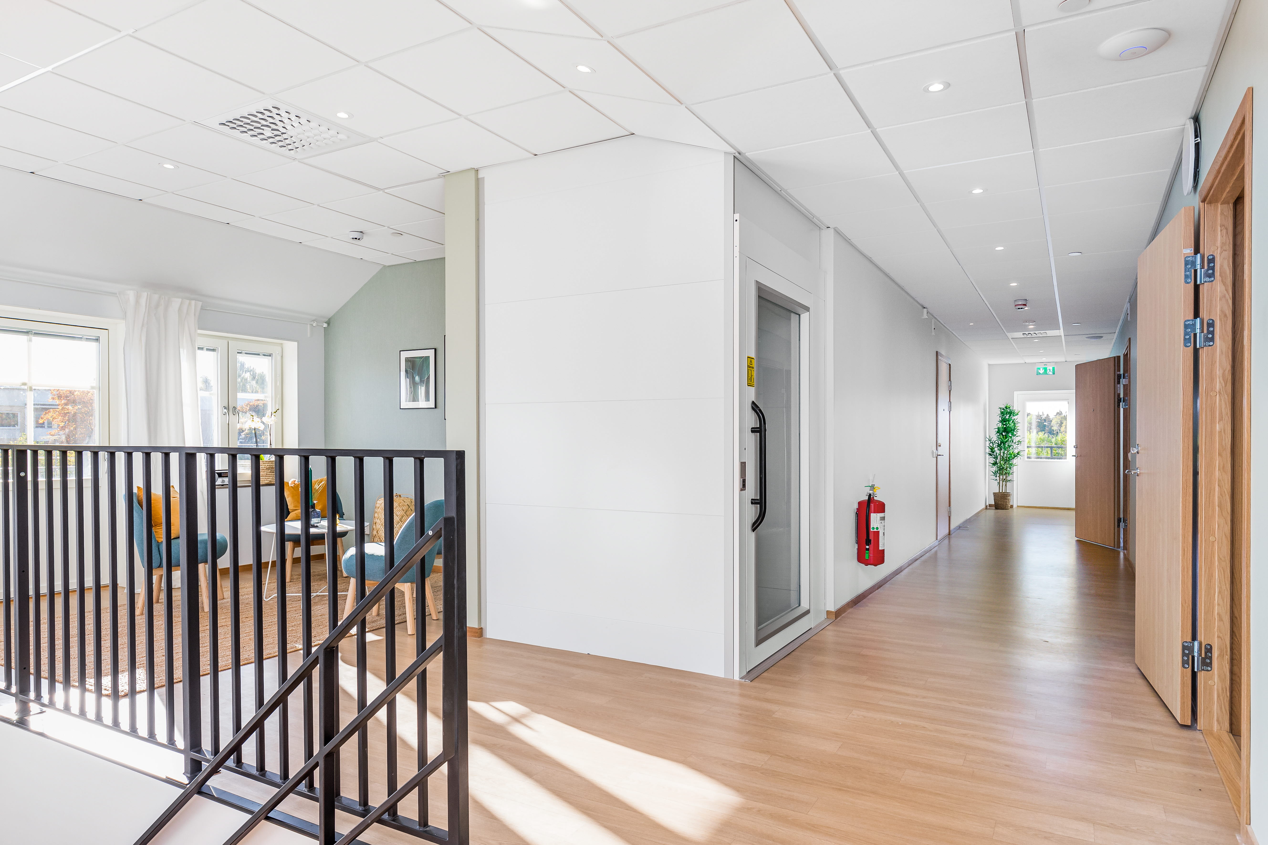 A large empty room with a wood floor
