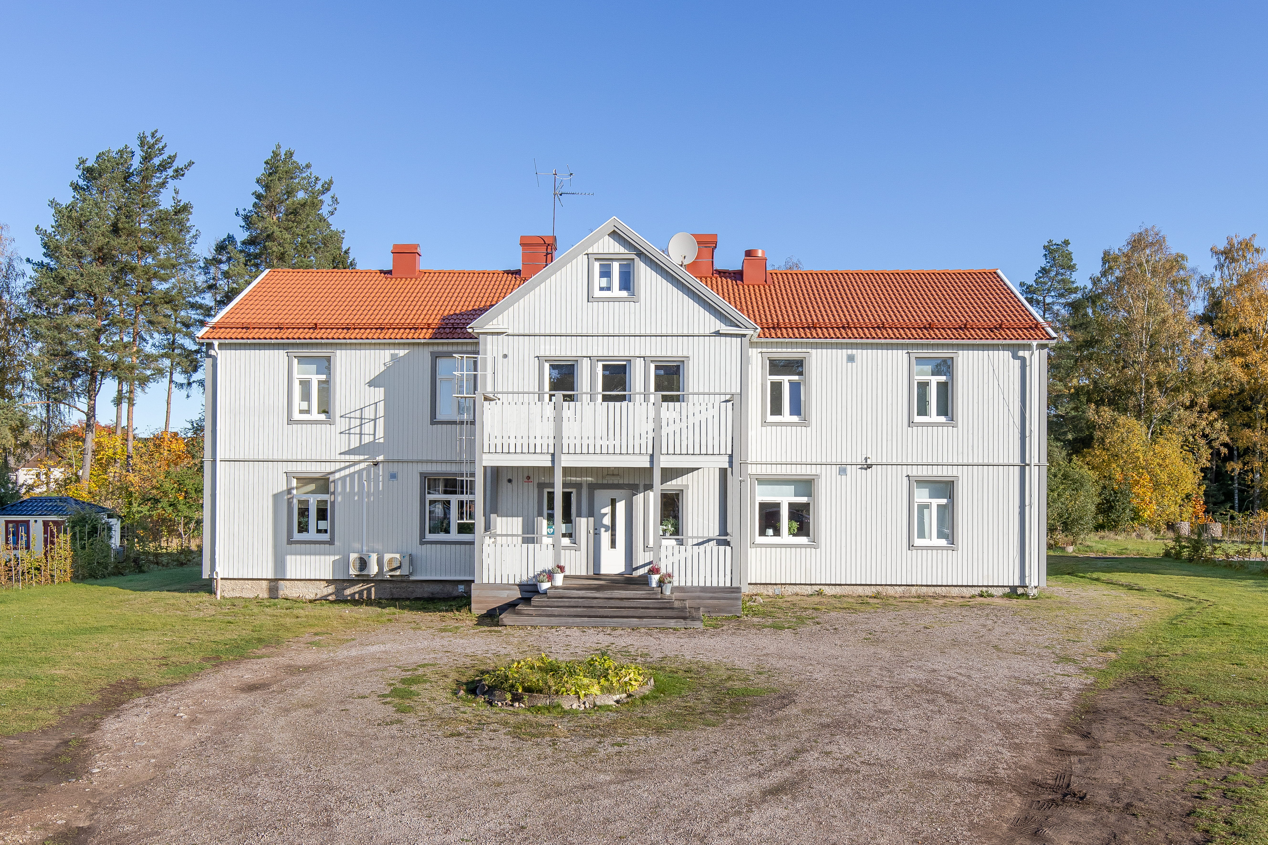 A house with a grass field