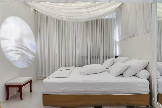 A large bed in a room