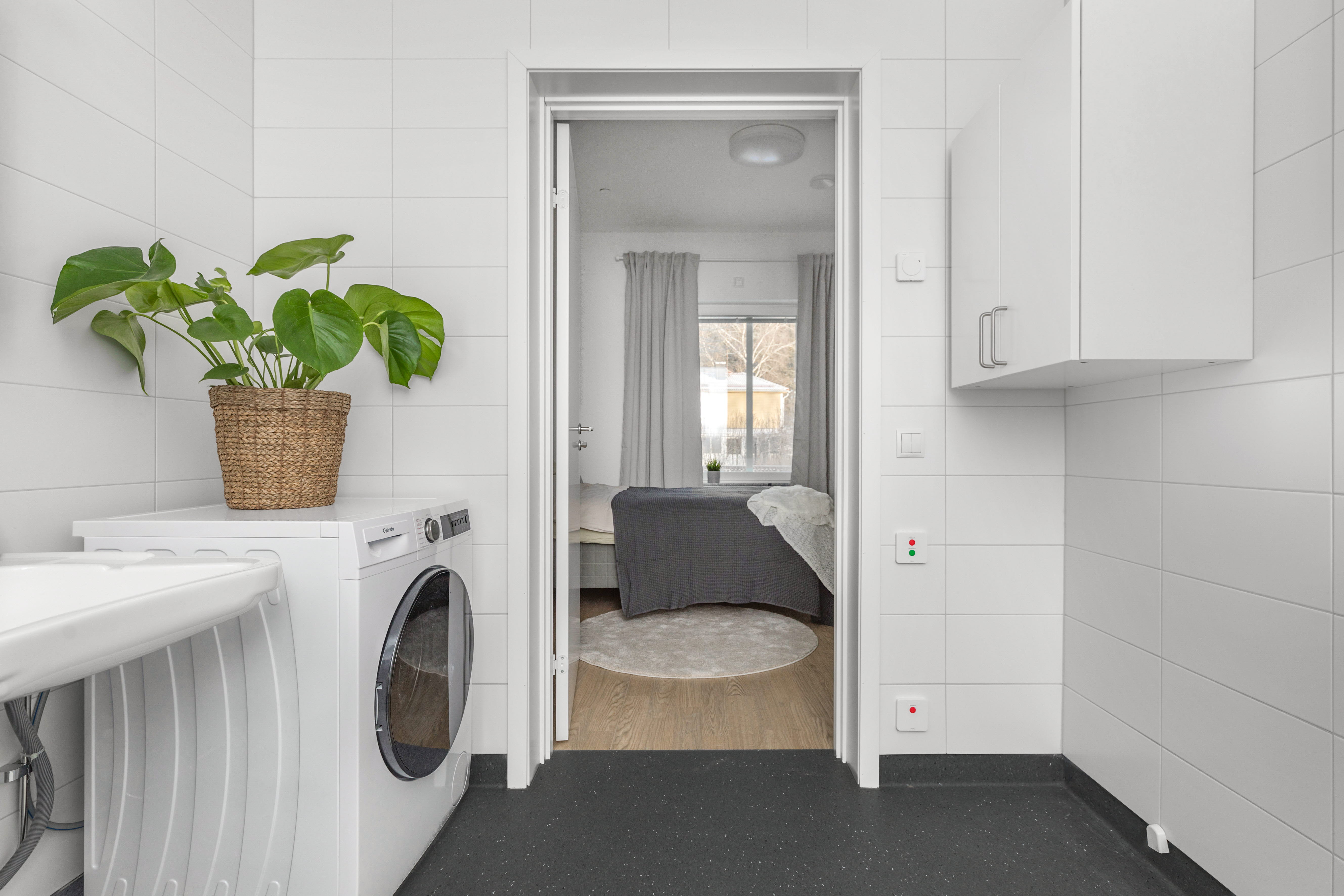 A room with a sink and a window