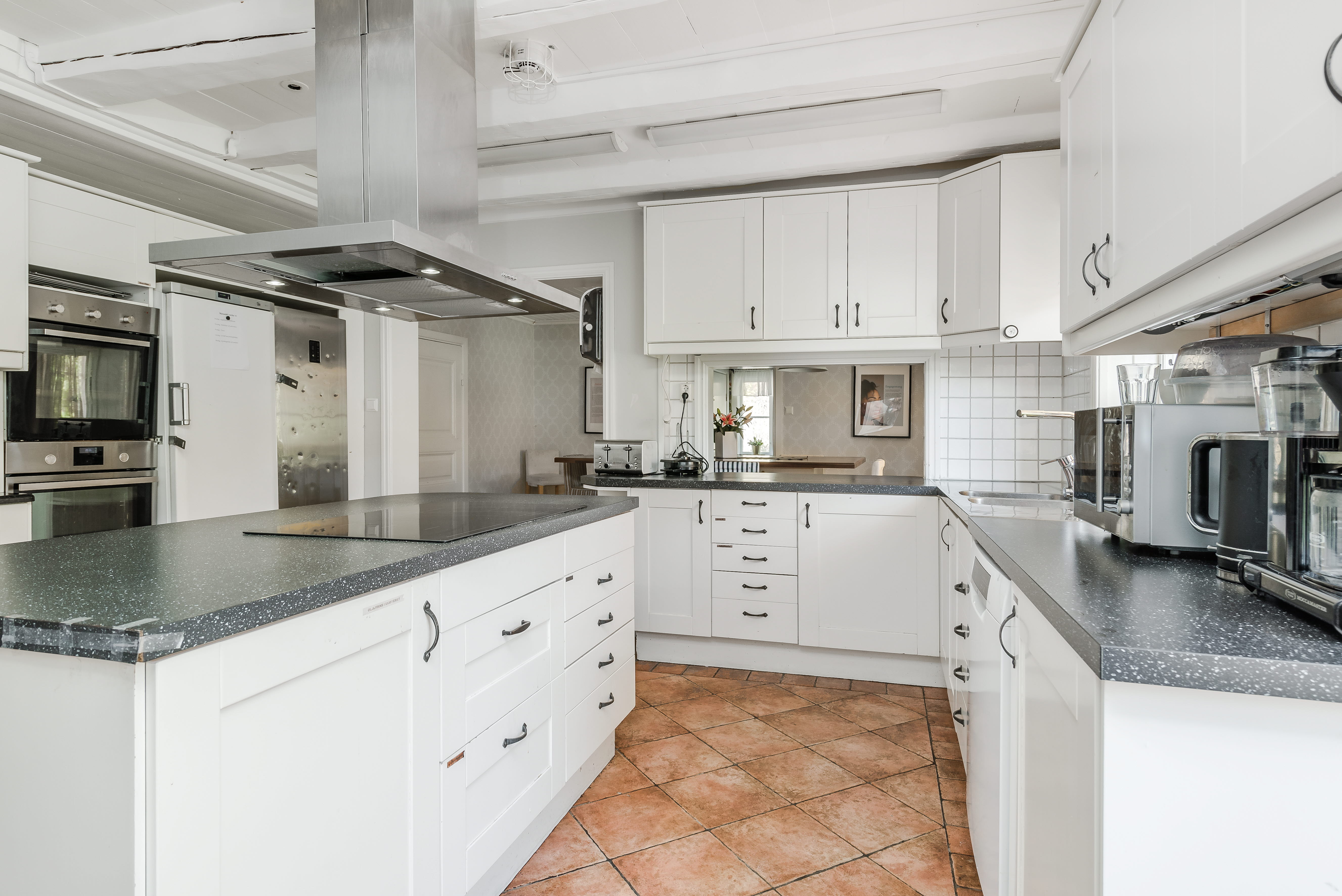 A kitchen with a stove top oven