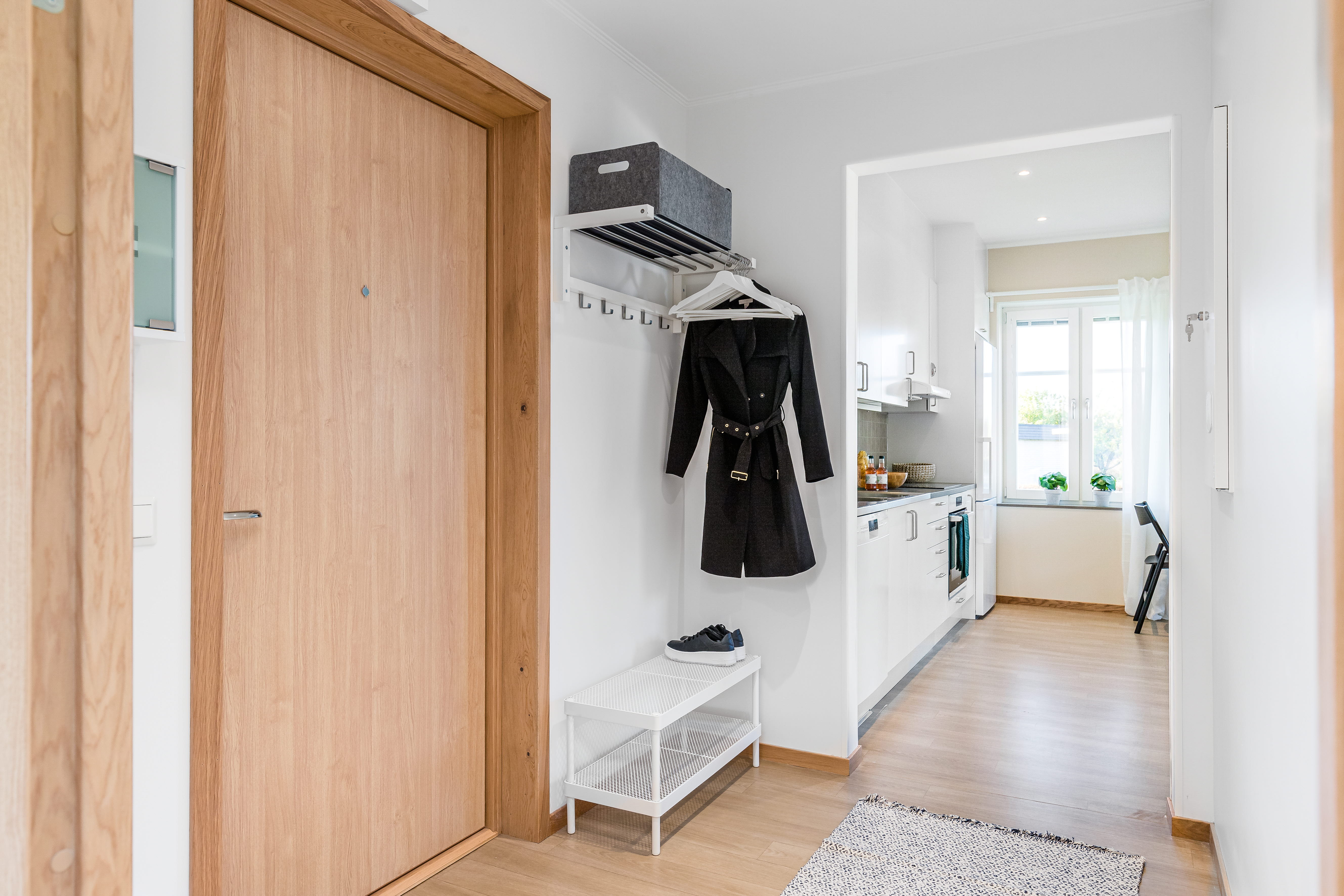 A kitchen with a wood floor