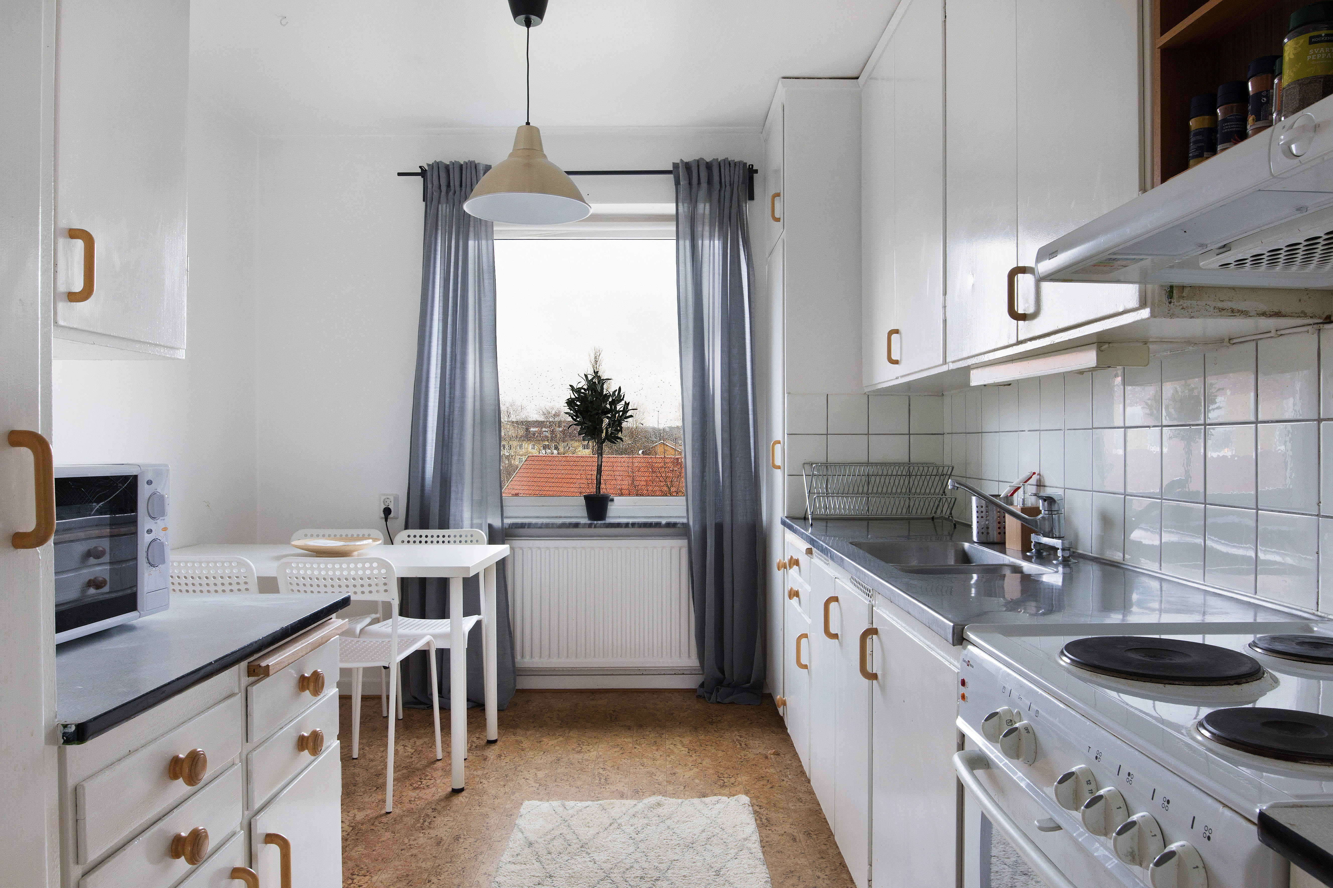 A large kitchen with stainless steel appliances