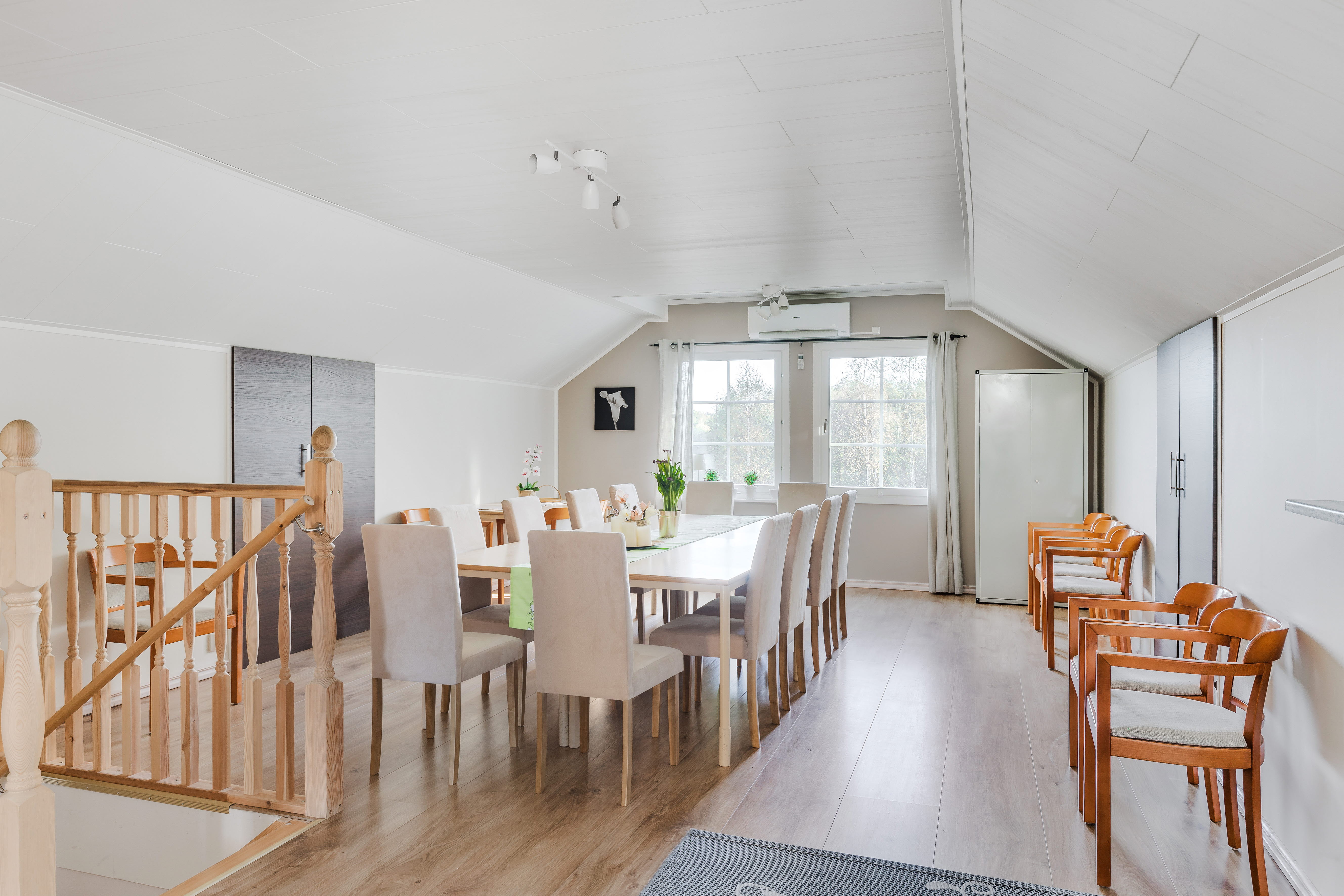 A kitchen with a dining room table