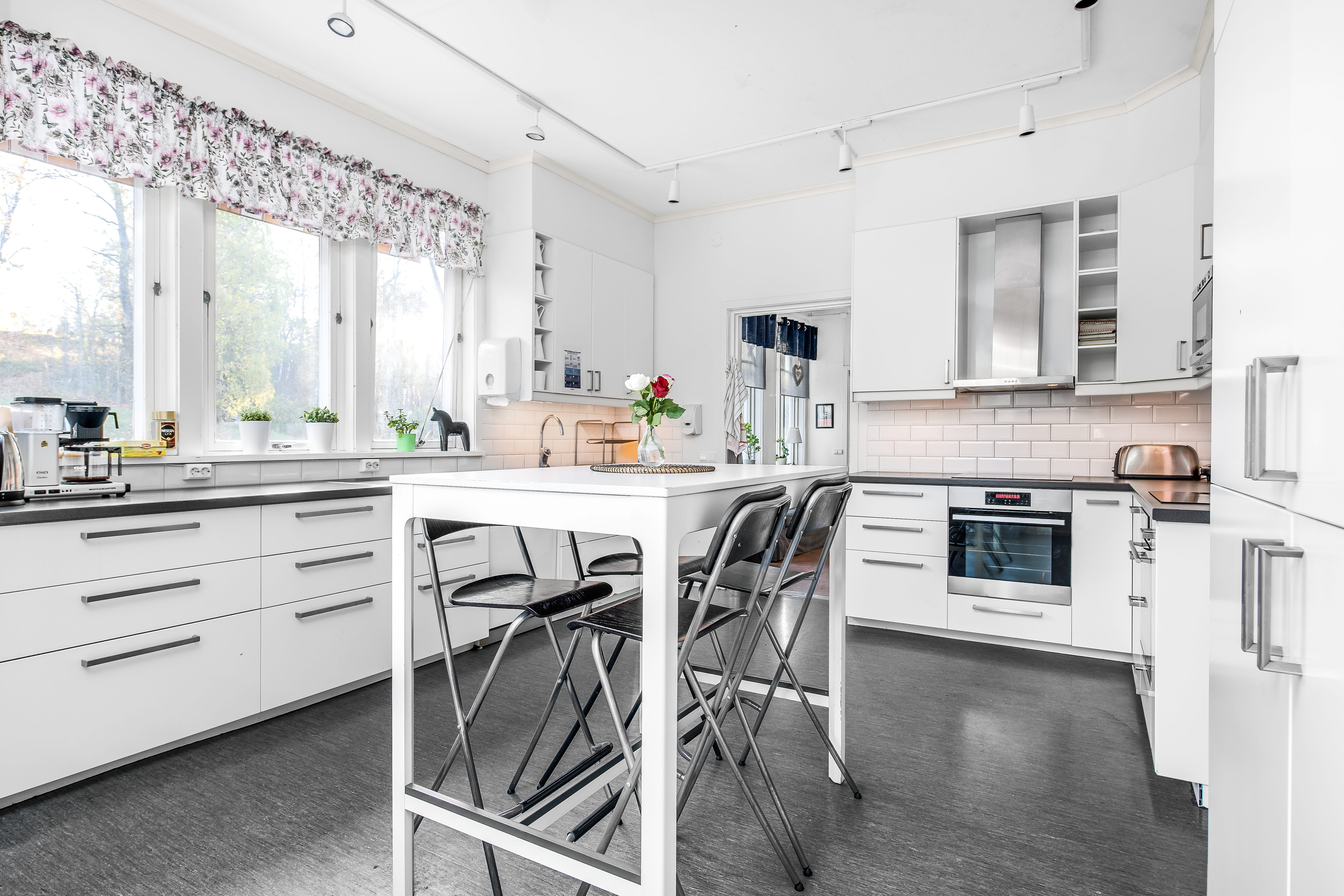A kitchen with a tile floor