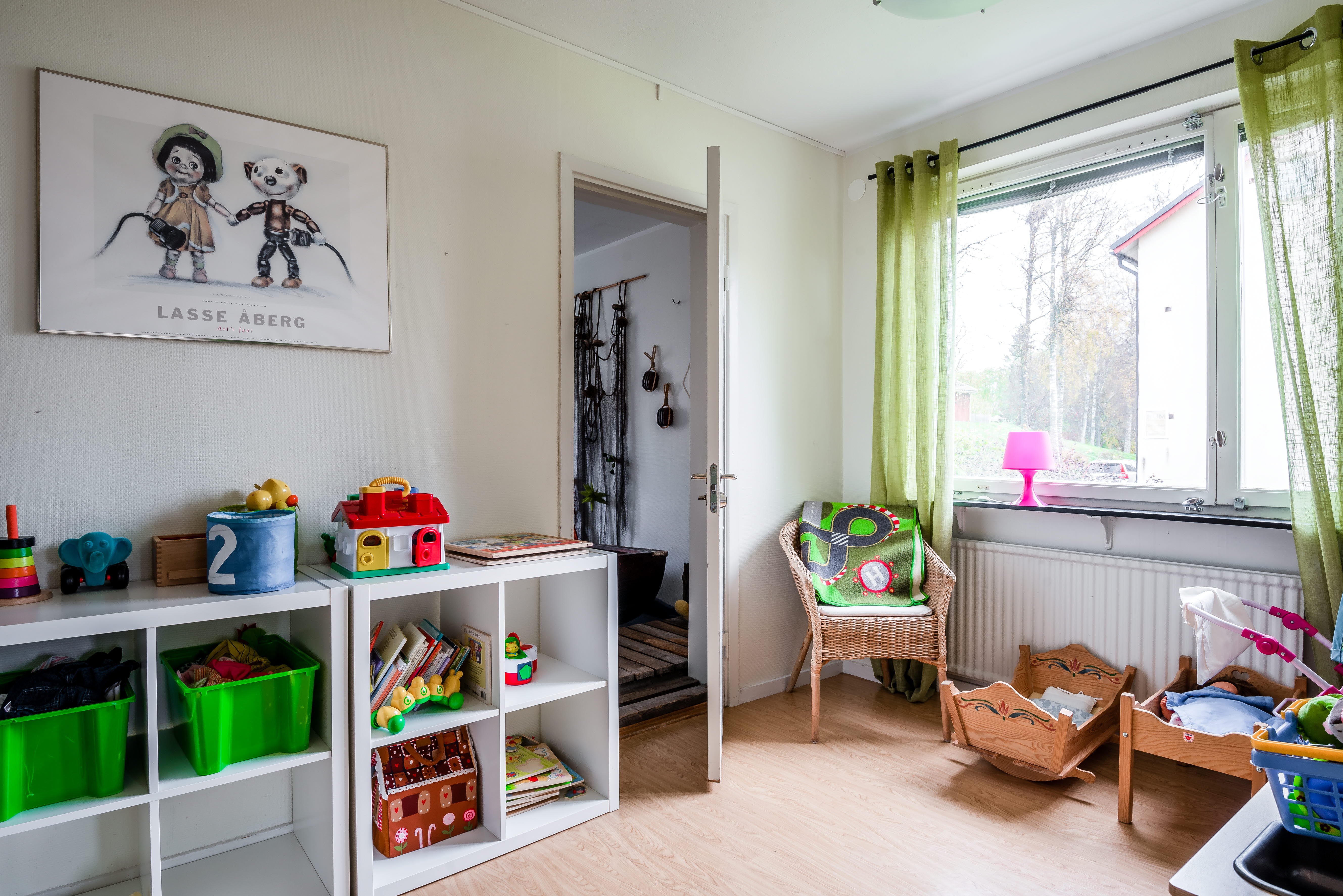 A room filled with furniture and a large window