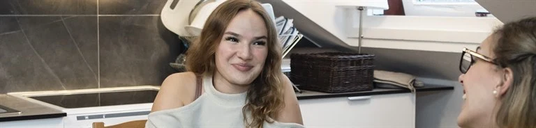 A woman sitting at a table