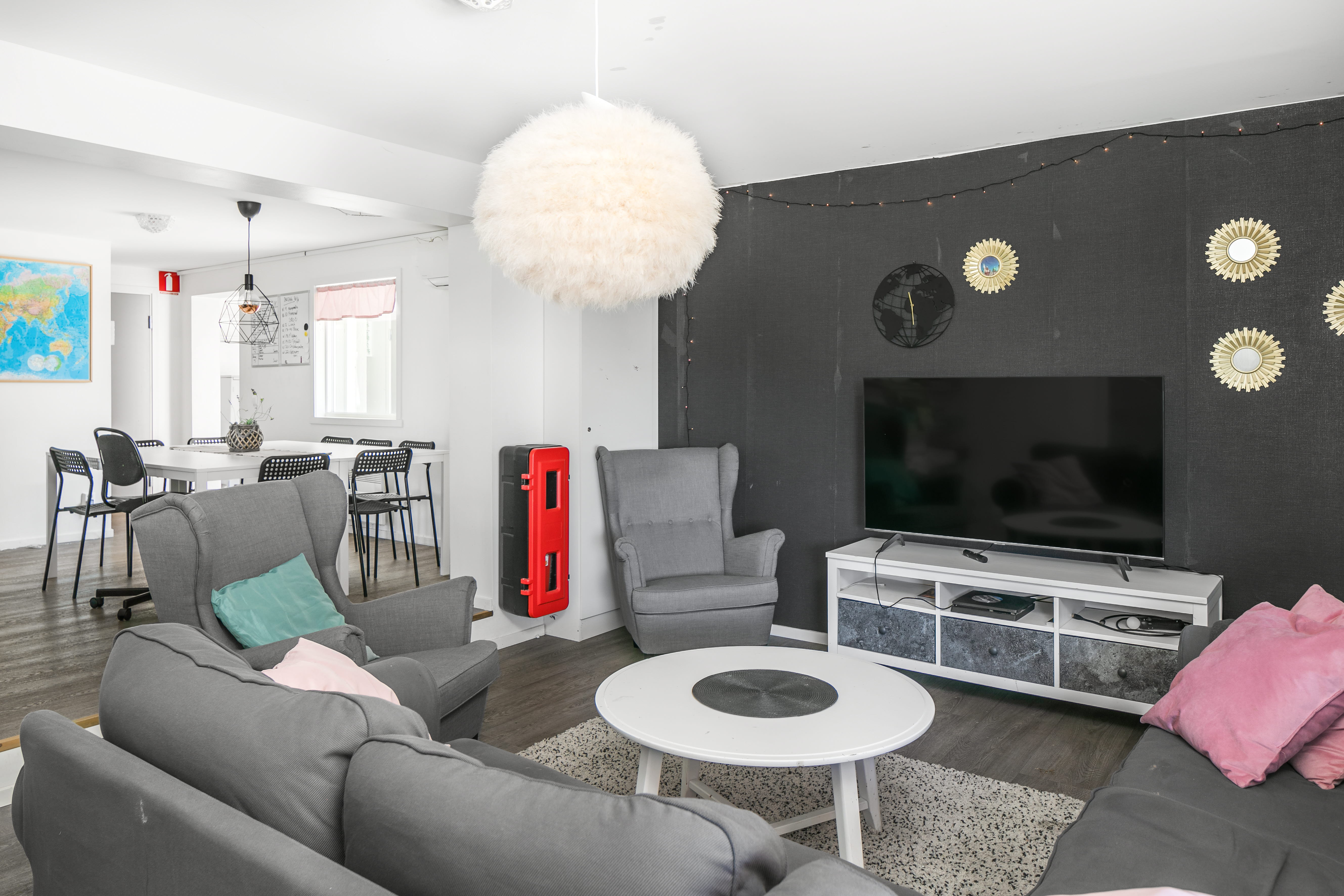 A living room filled with furniture and a fire place
