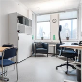 An office with a desk and chair in a room