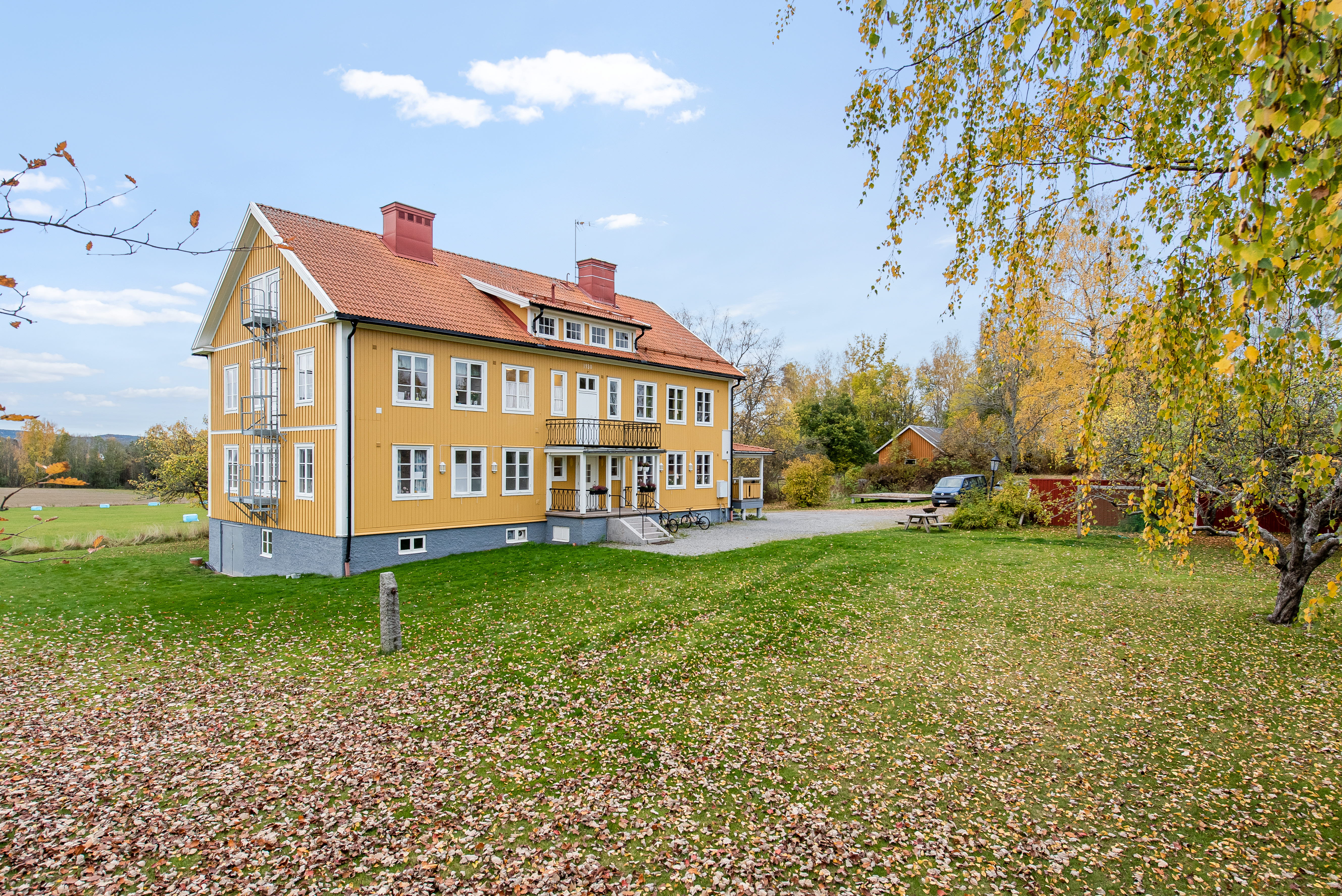 A house with a grass field