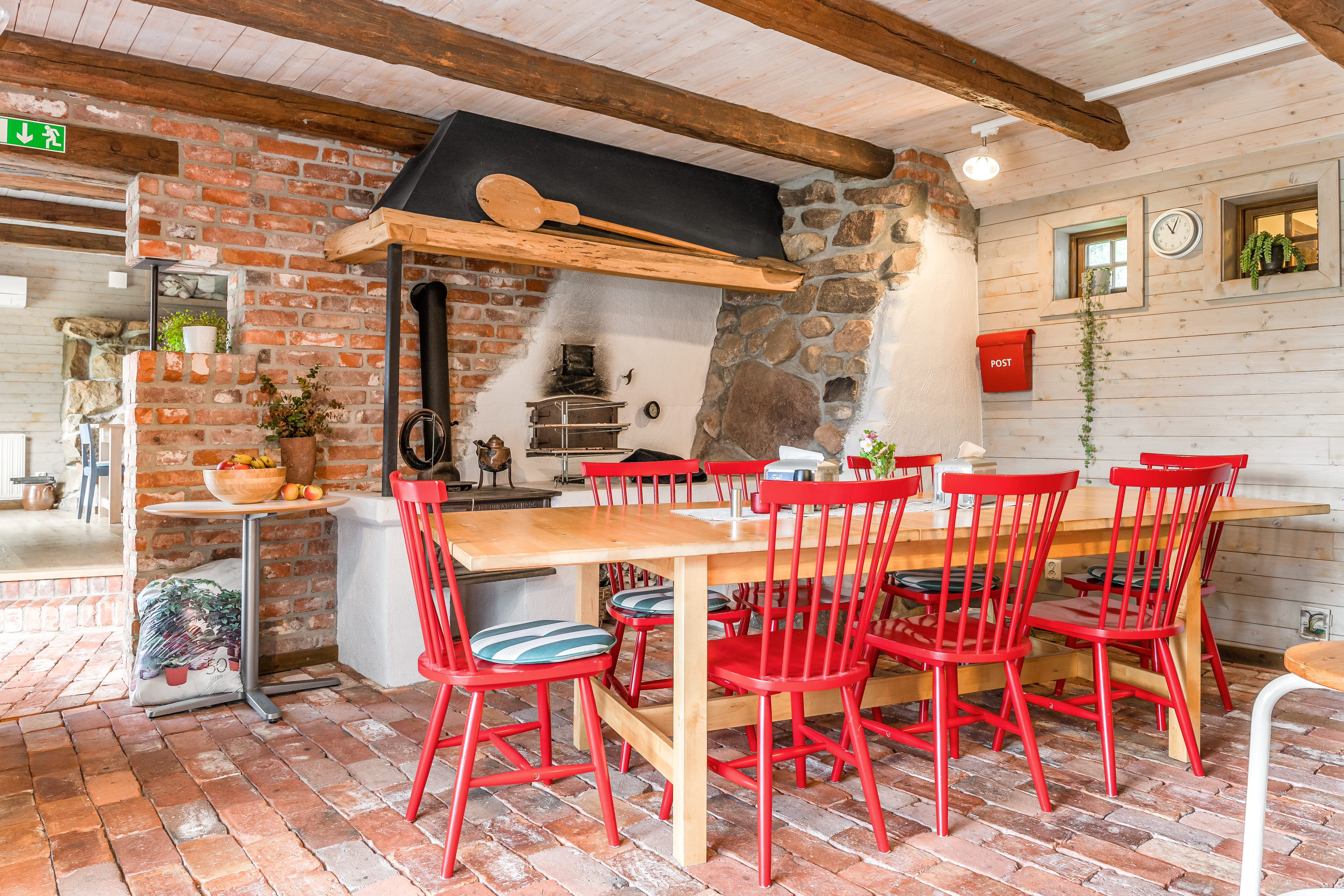 A dining room table in front of a brick building