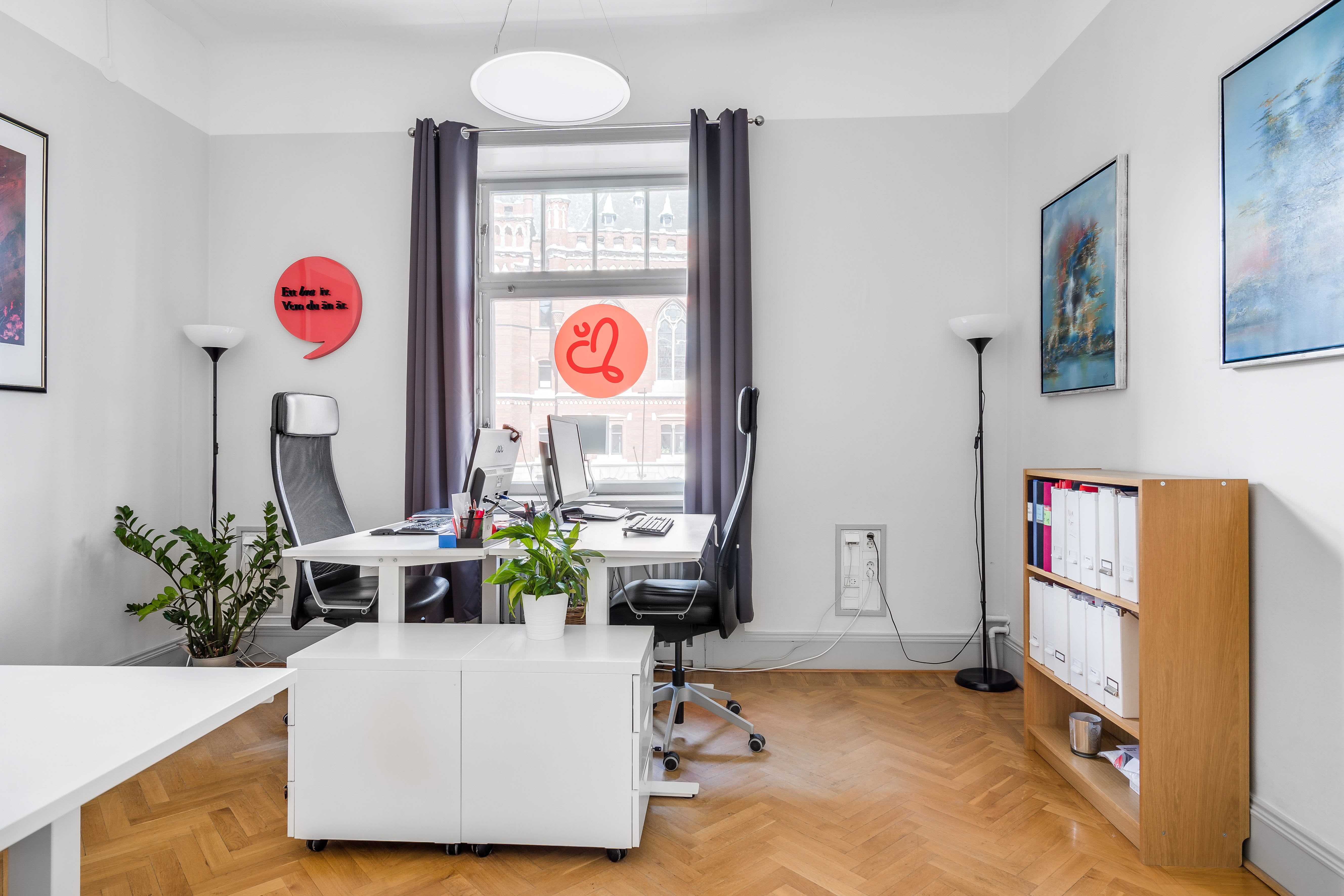 A living room filled with furniture and a flat screen tv