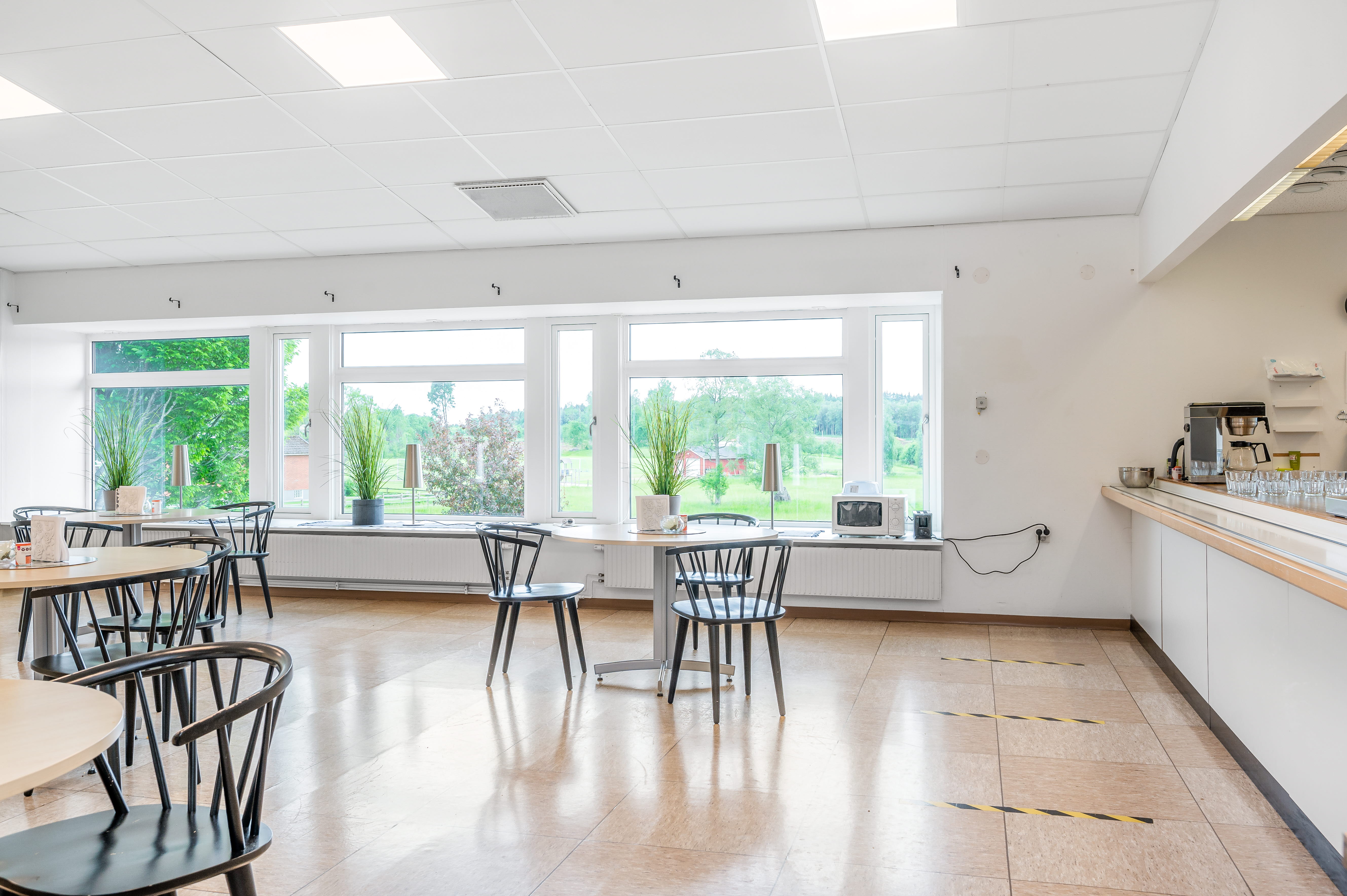 A kitchen with a wood floor
