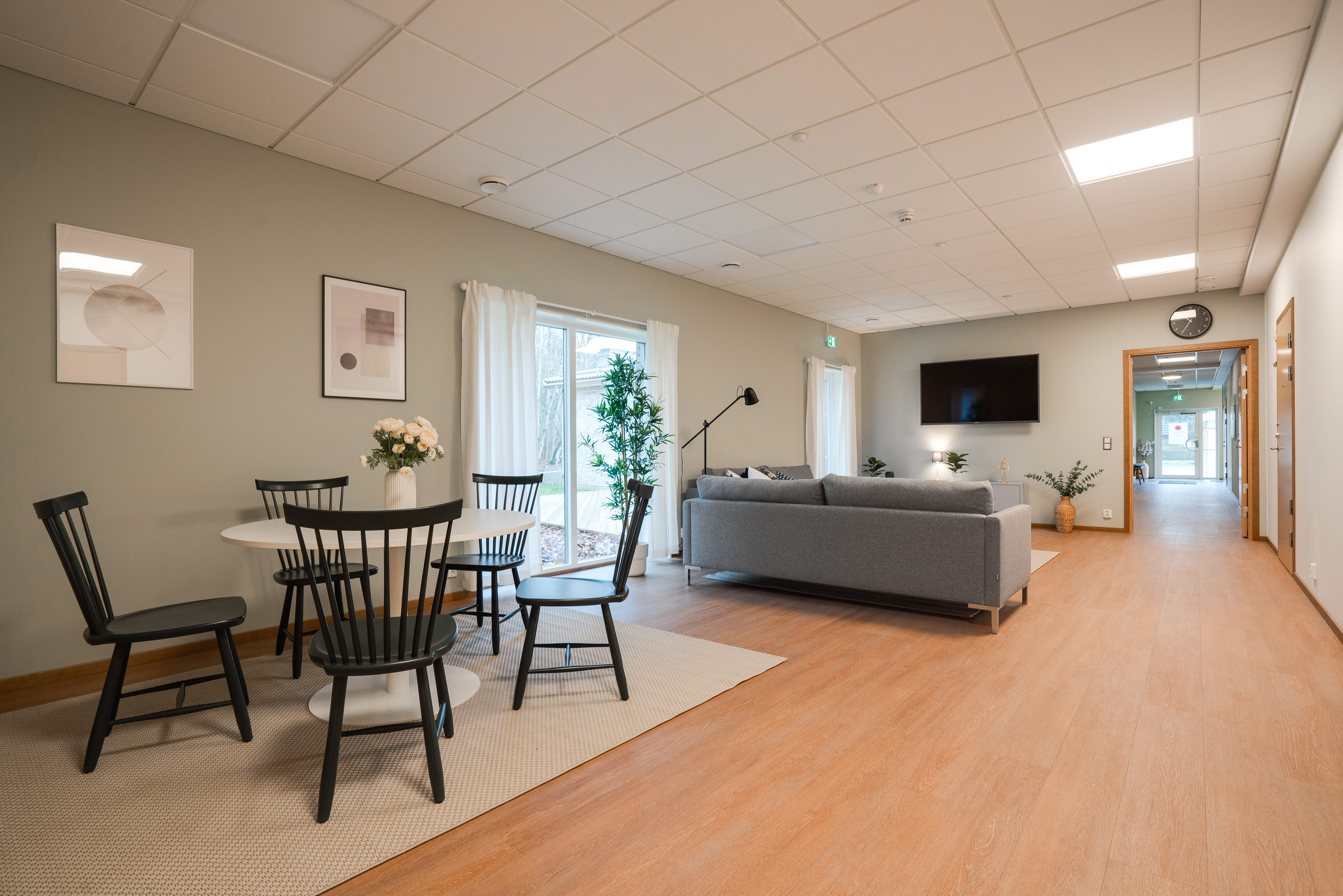 A room filled with furniture and a wood floor