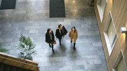 Three women in a stair case