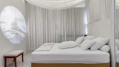 A large bed in a room