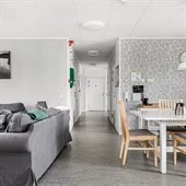 A living room filled with furniture and a table
