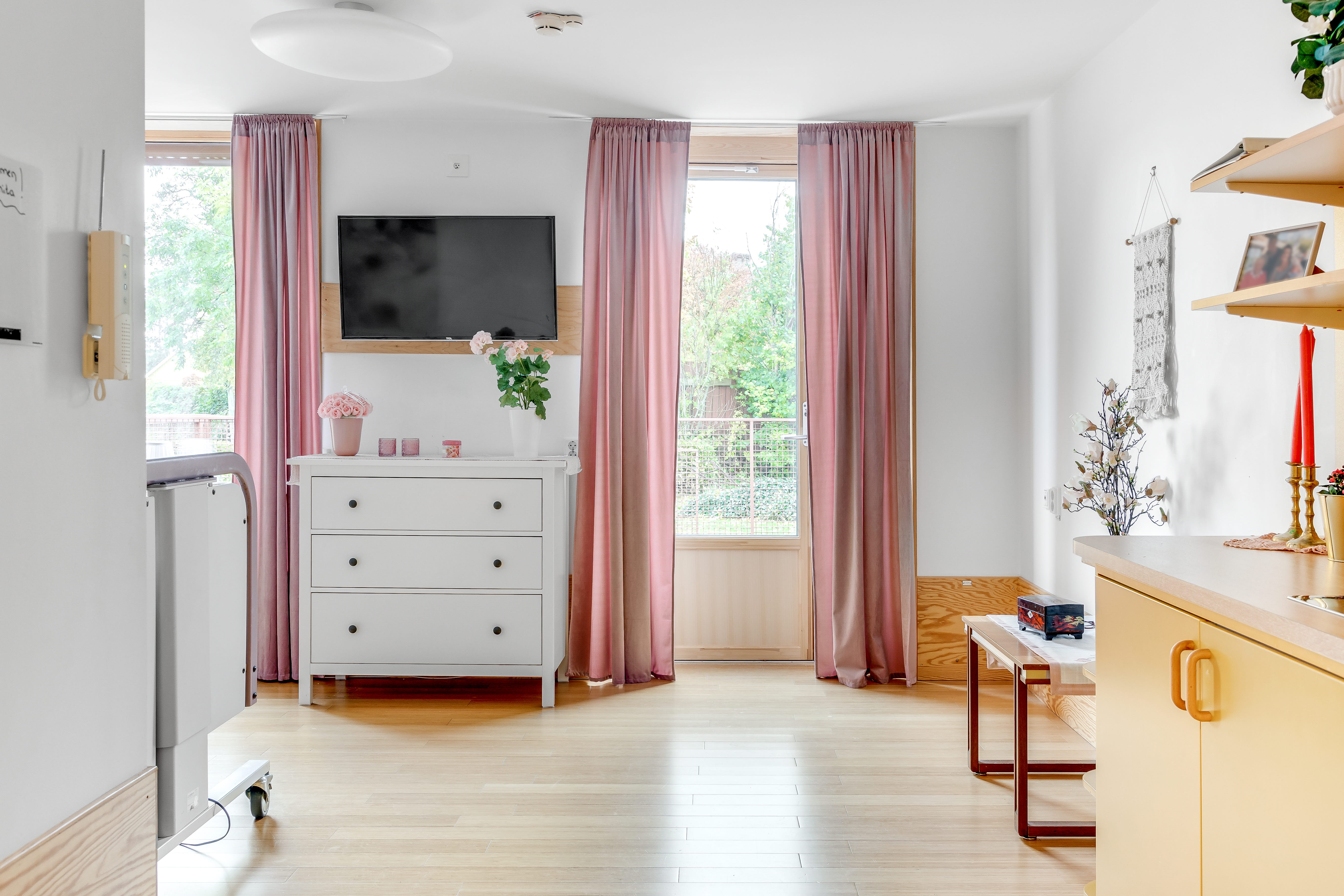 A room filled with furniture and a large window