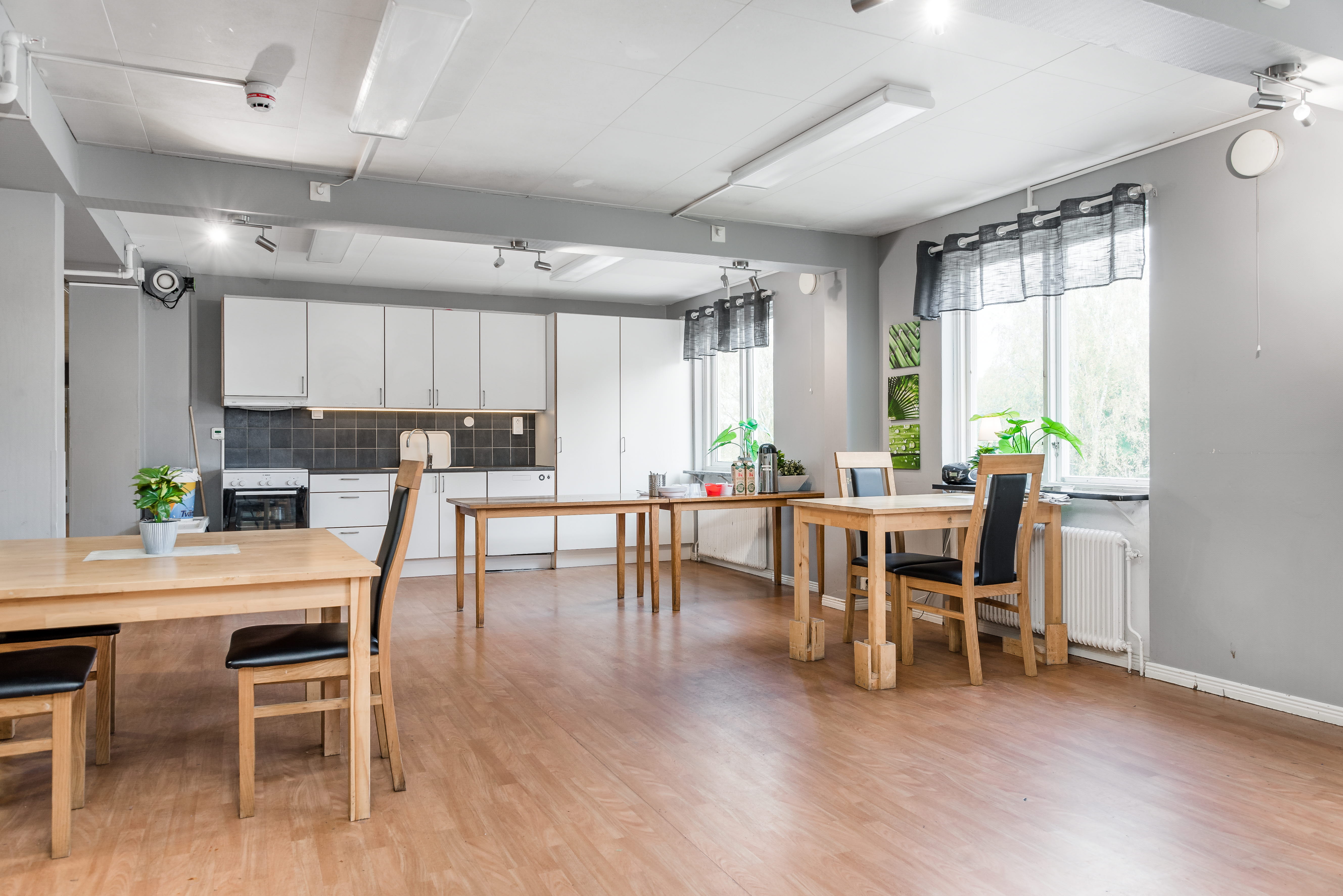 A room filled with furniture on top of a hard wood floor