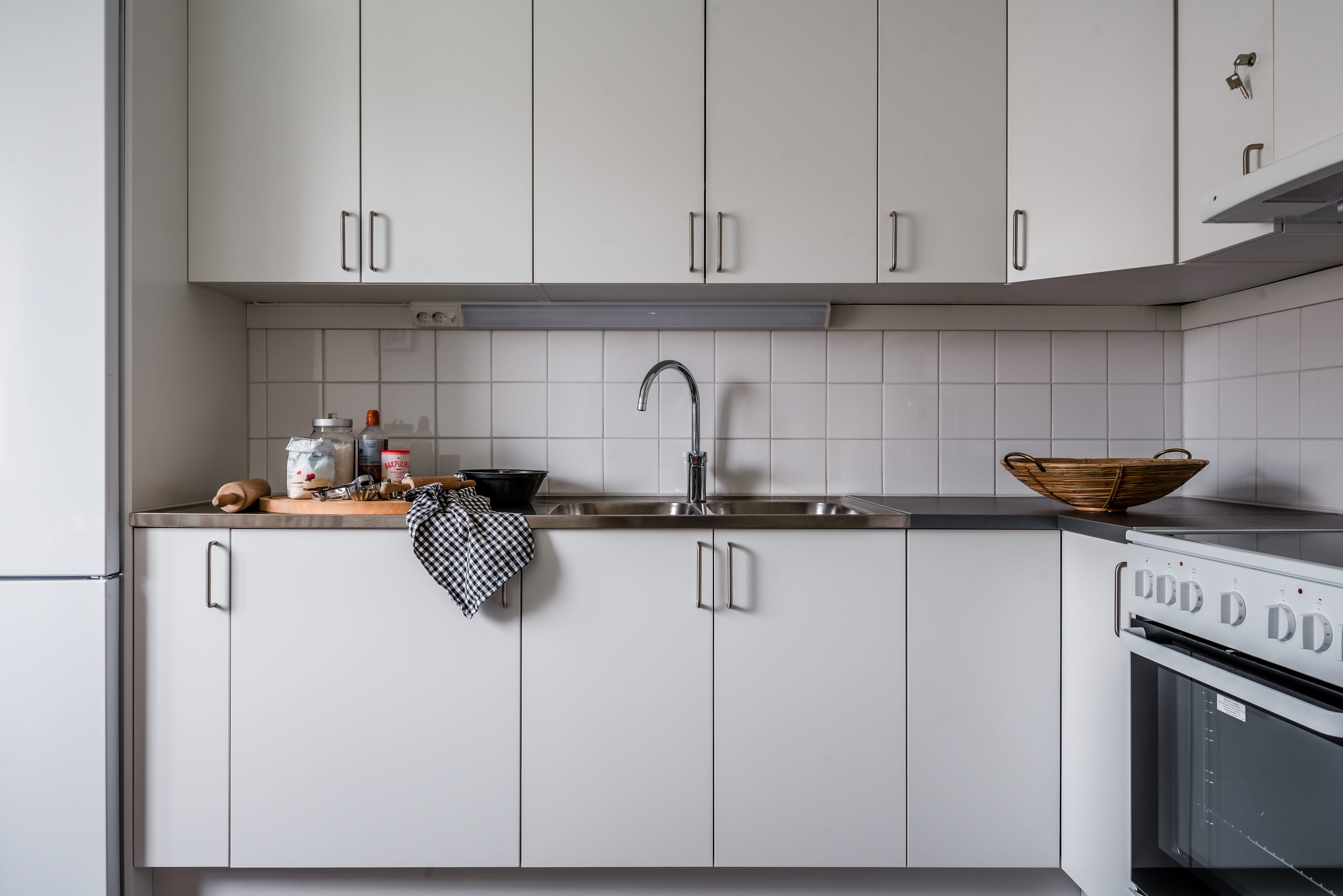 A stove top oven sitting inside of a kitchen