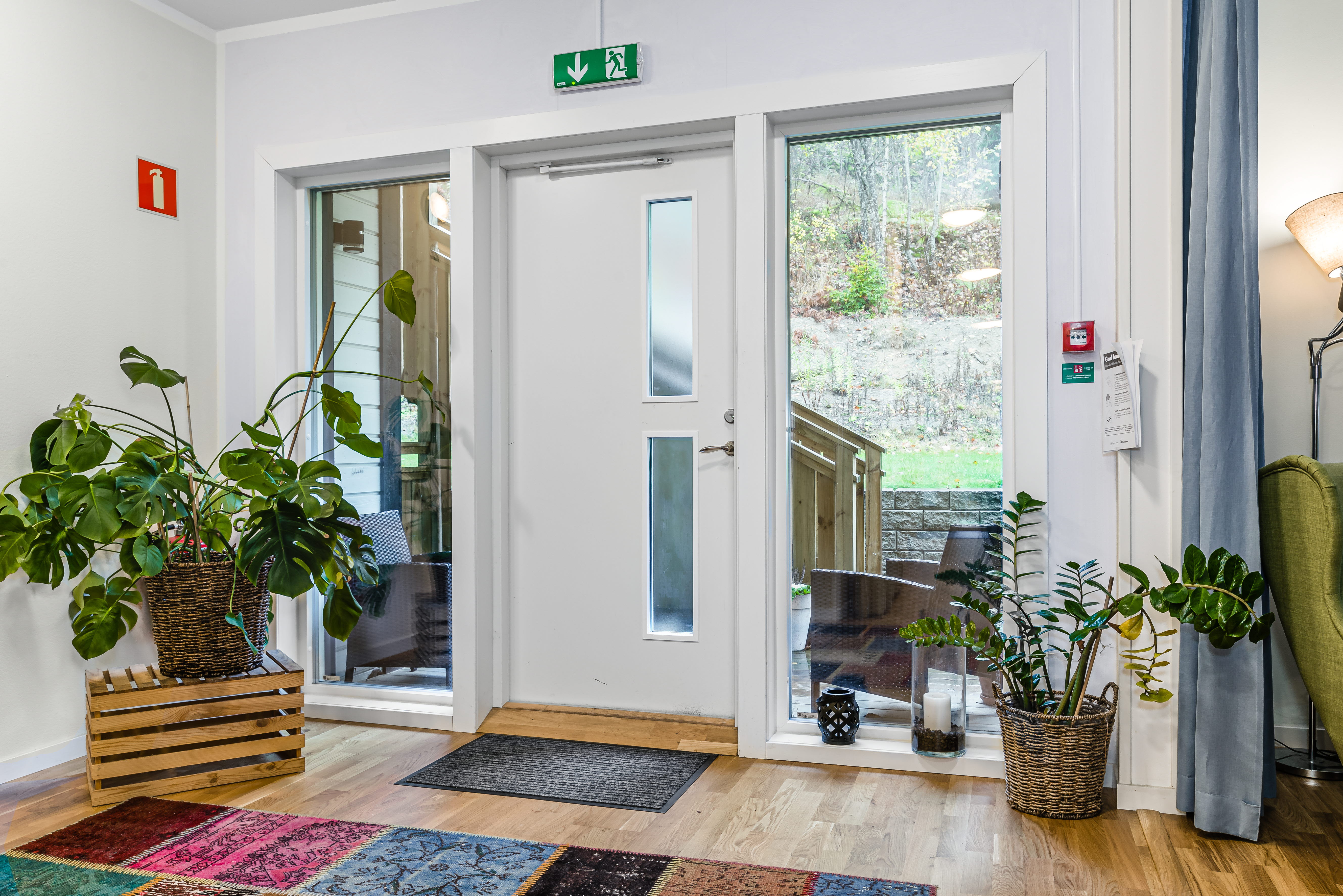 A living room filled with furniture and a large window