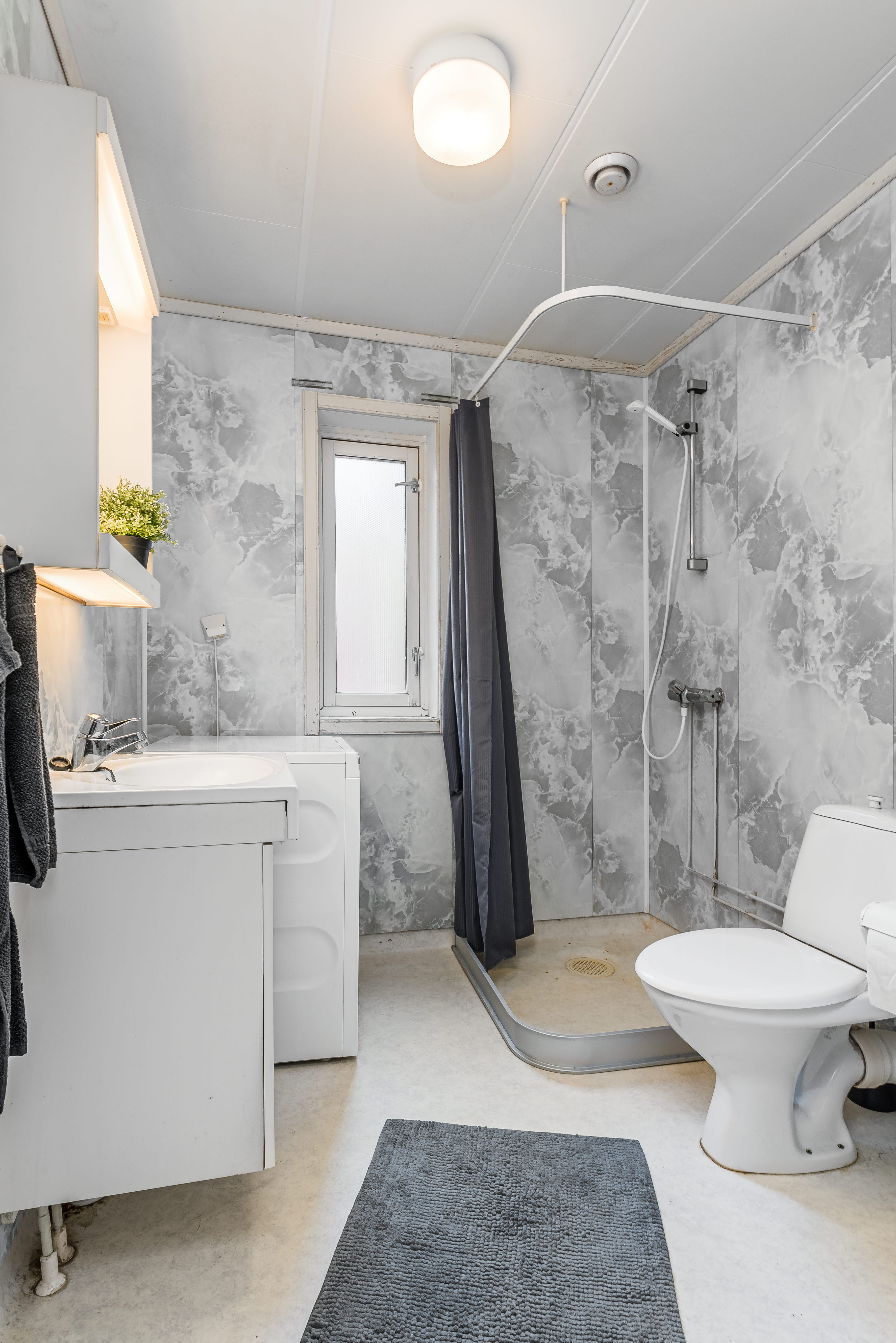 A room filled with furniture and a sink