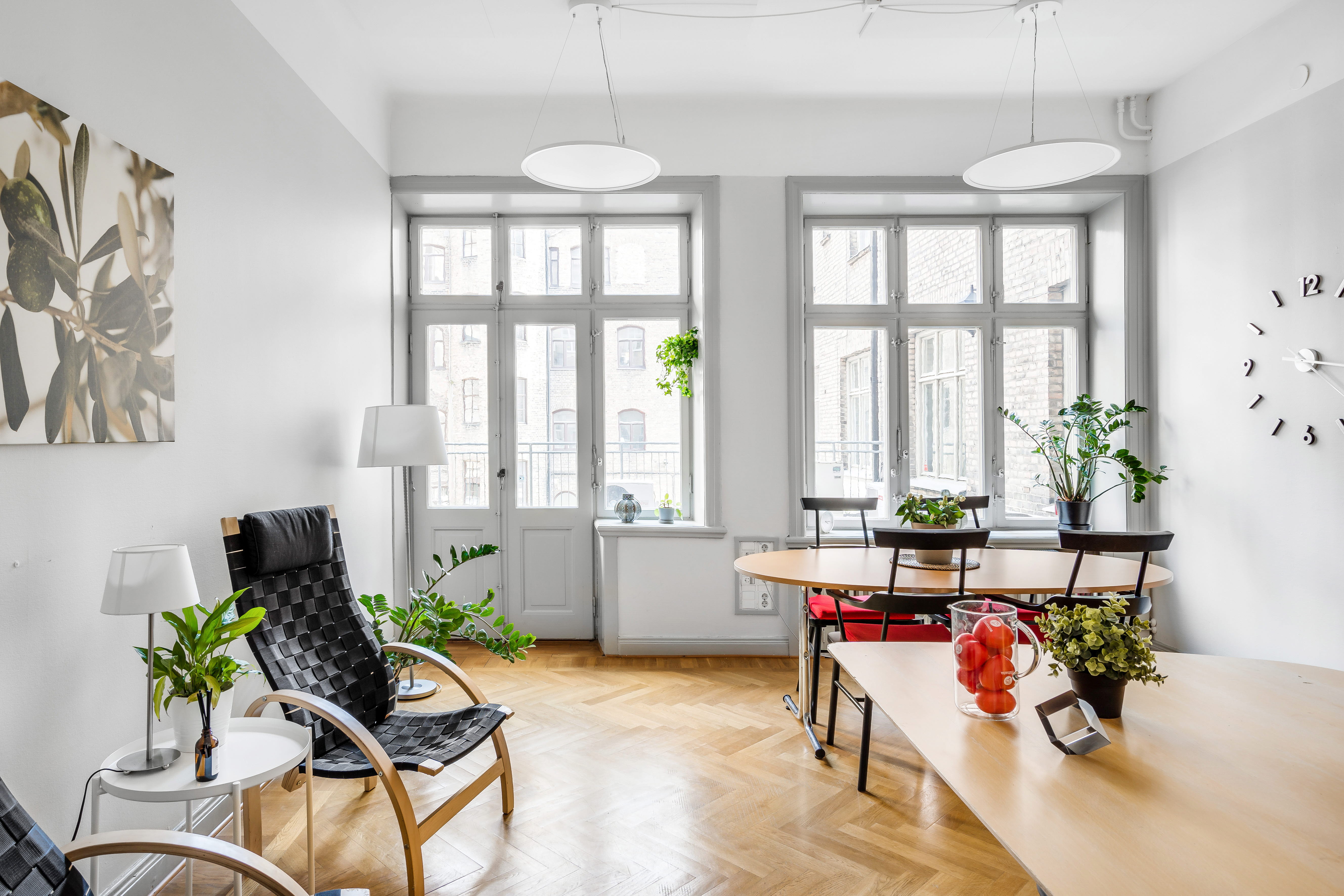 A living room filled with furniture and a large window