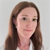 A woman smiling for the camera
