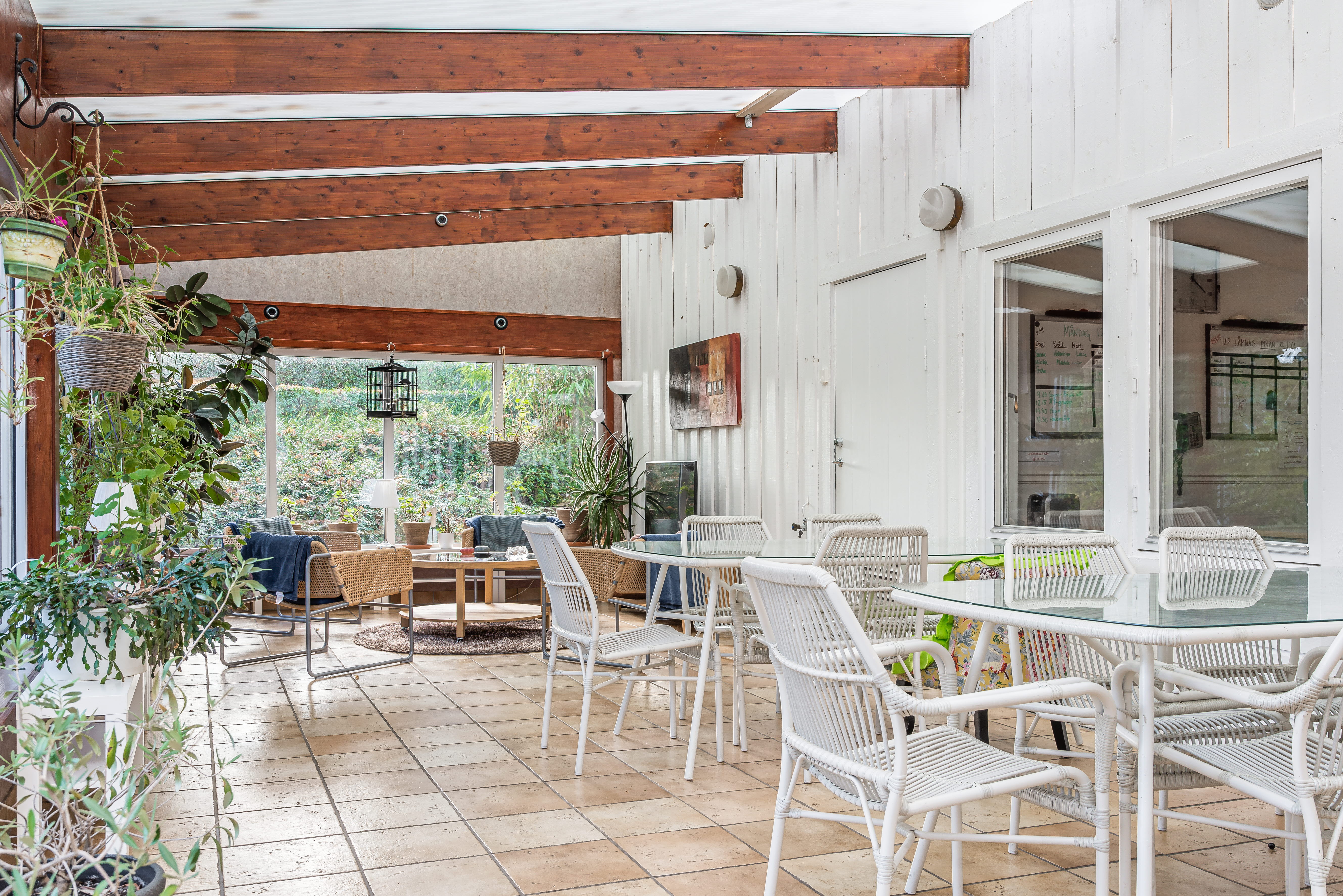 A dining room table in front of a building