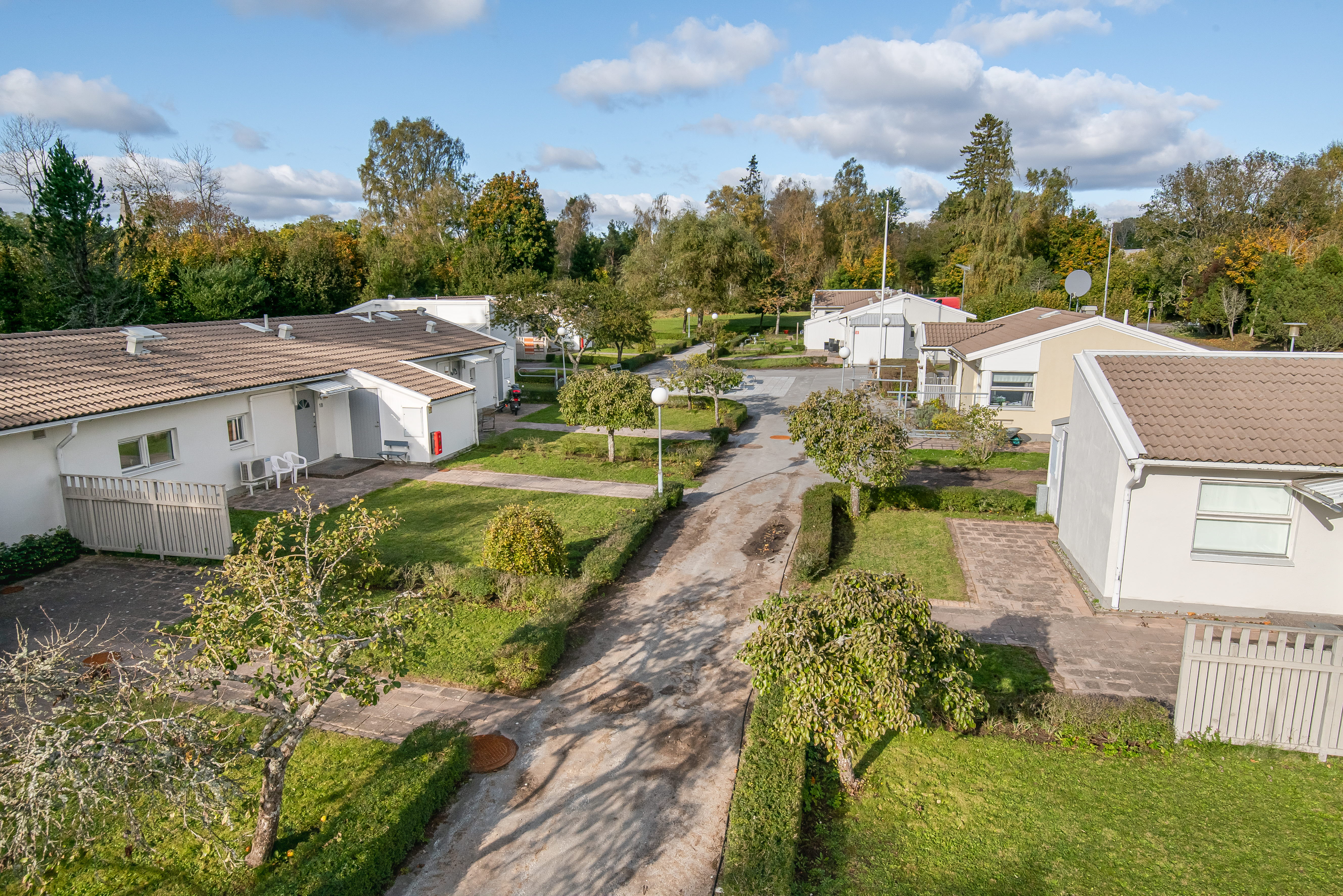 A house with trees in the background
