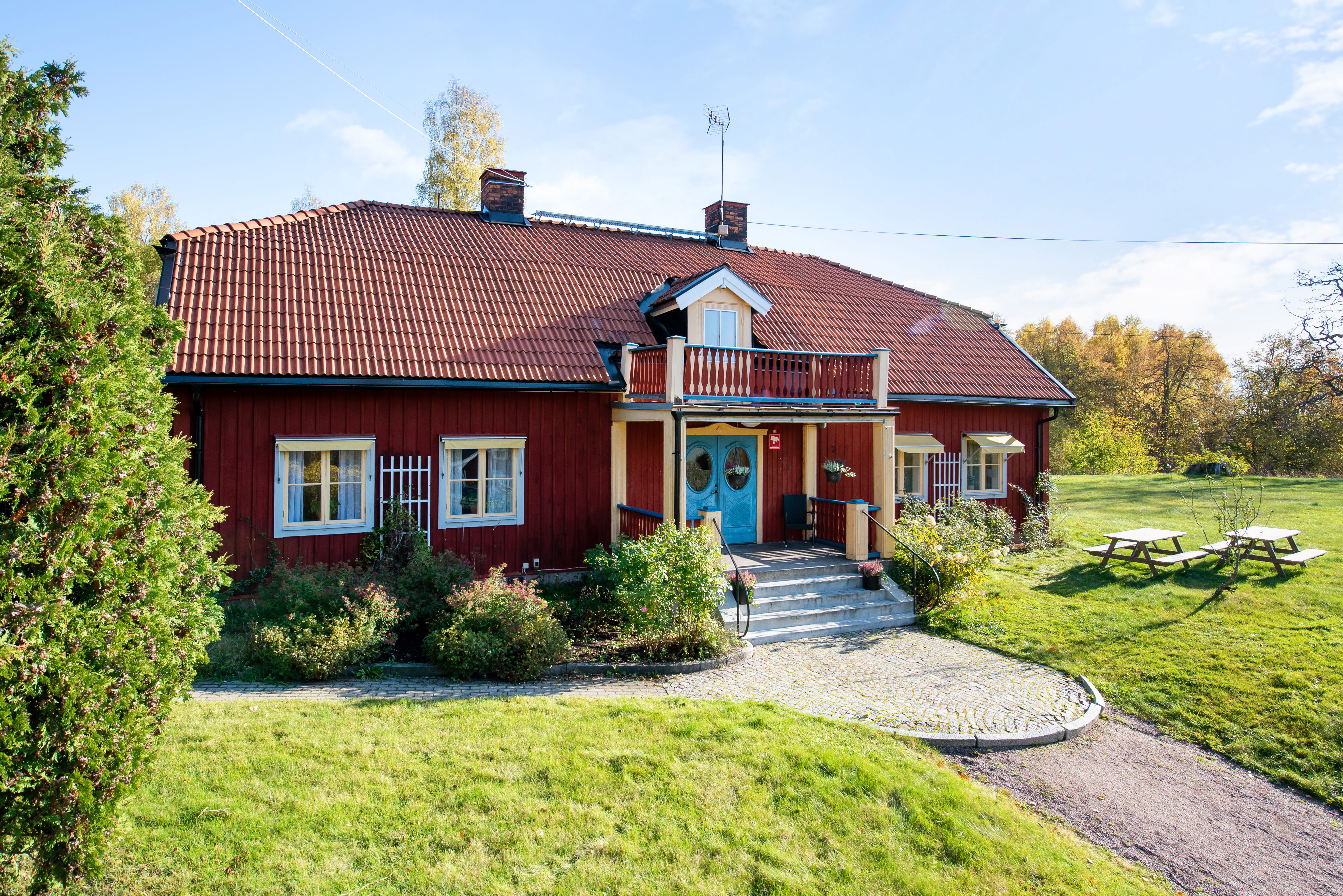 A small house on a grassy hill