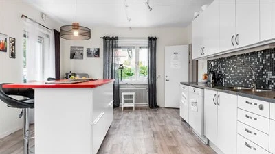 A large kitchen with stainless steel appliances