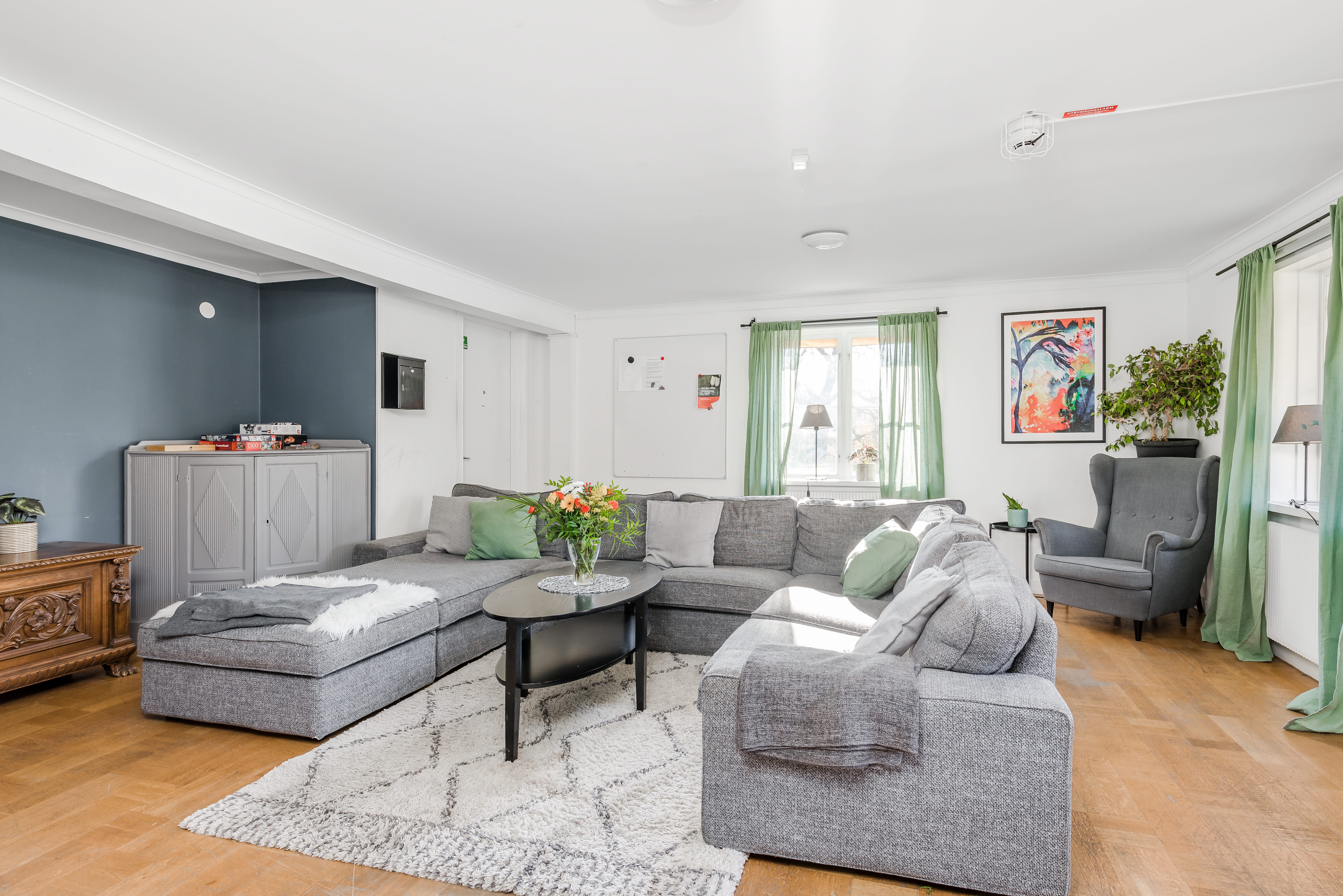 A living room filled with furniture and a flat screen tv