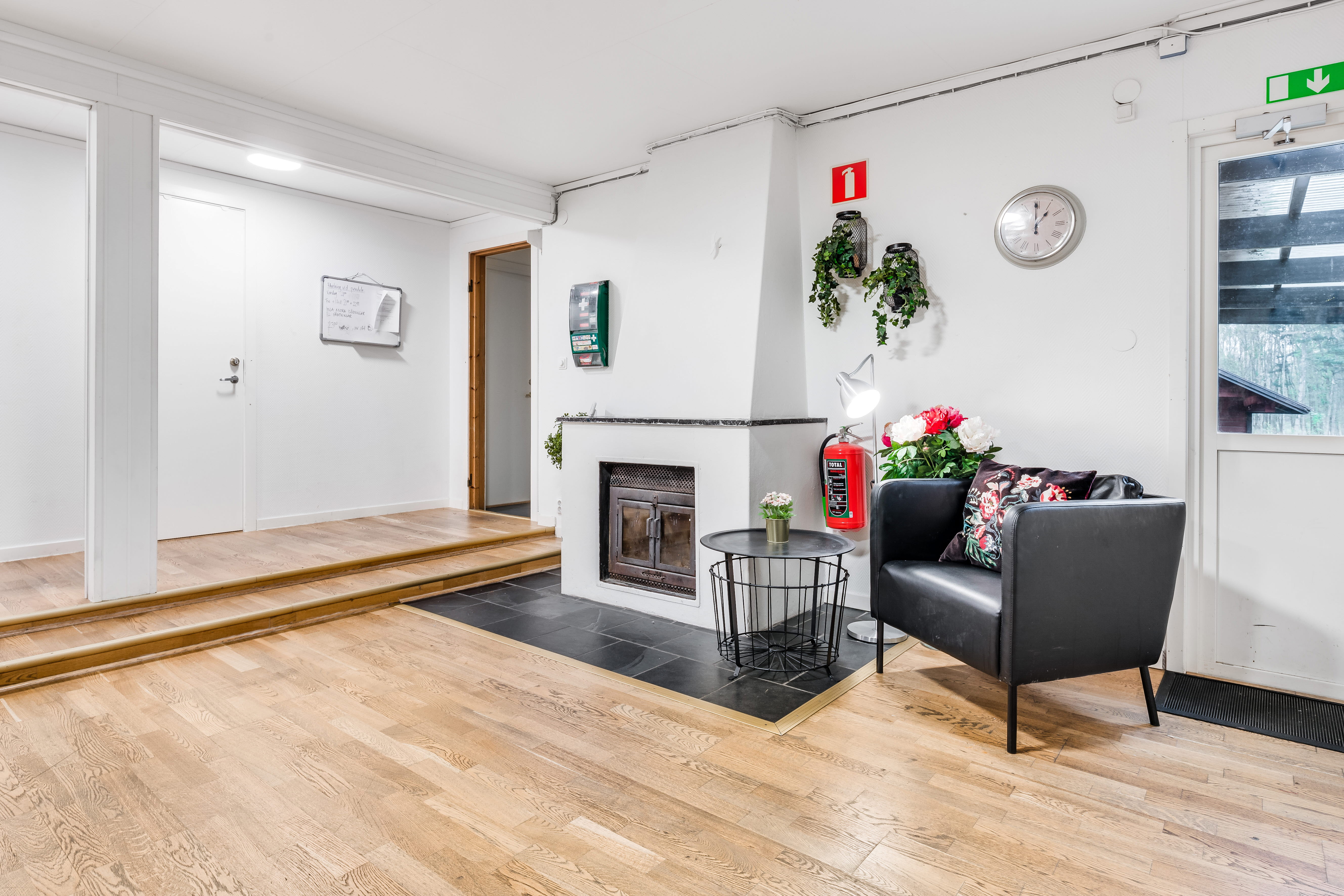 A living room filled with furniture and a large window