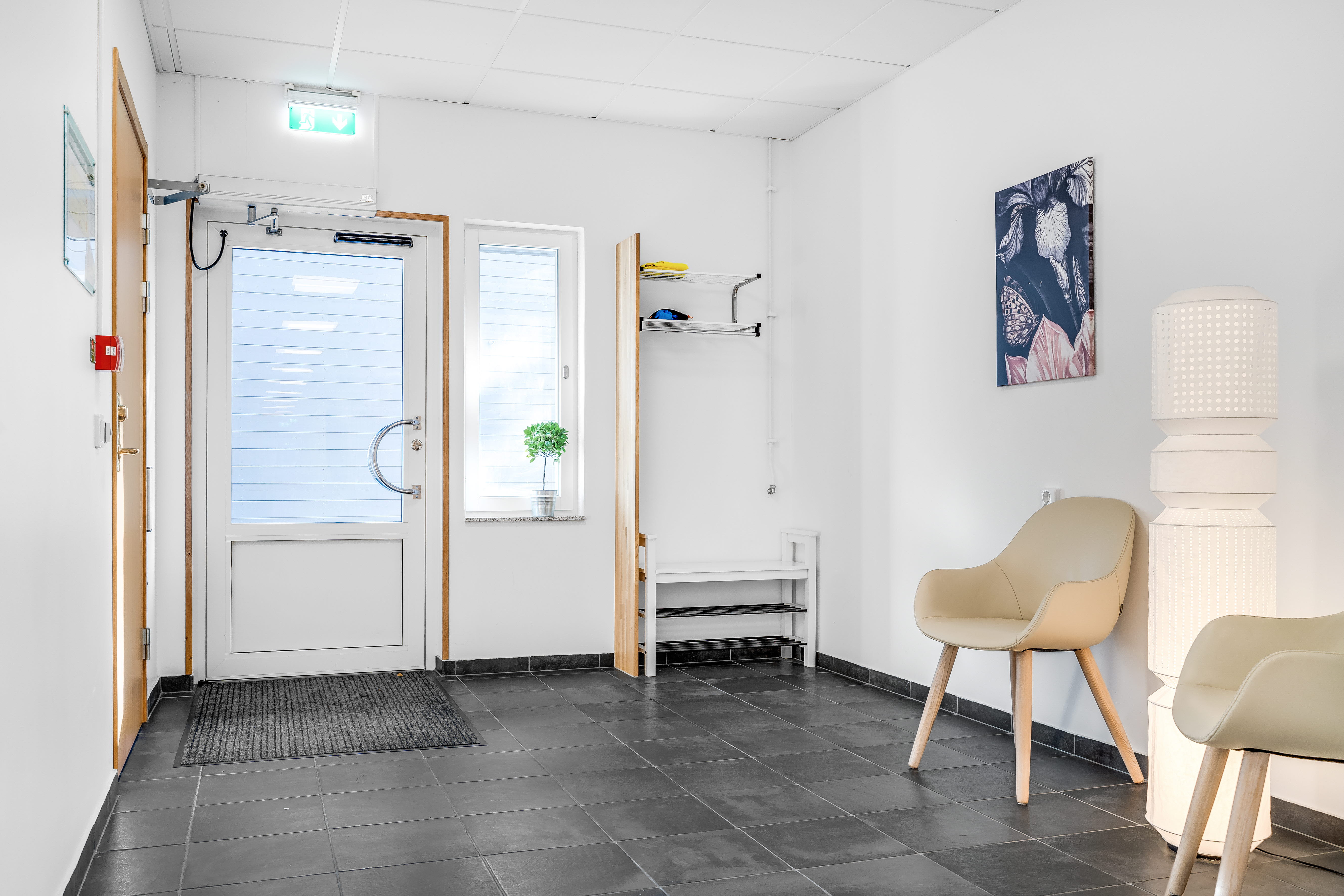 A room filled with furniture and a wood floor