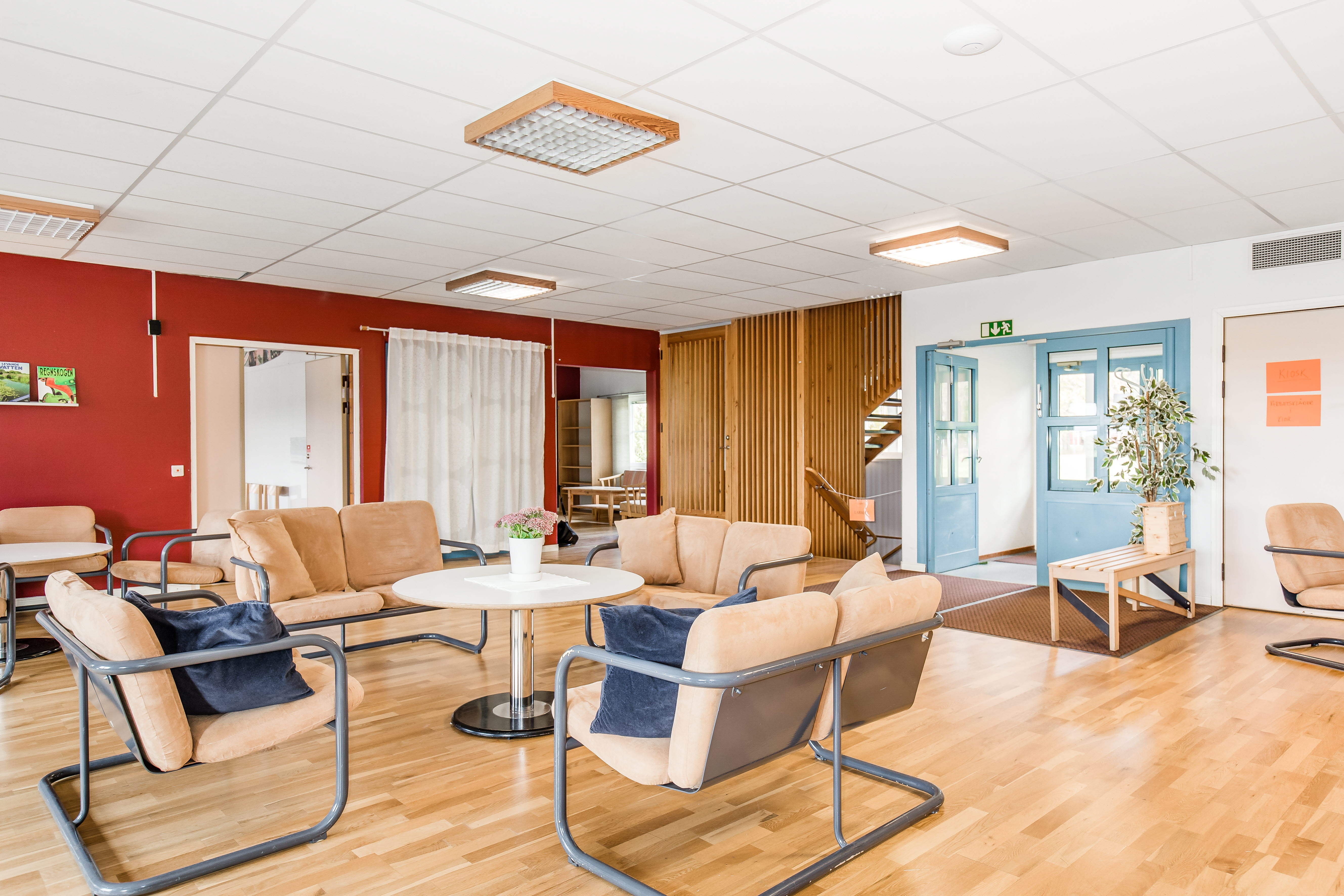 A room filled with furniture and a wood floor