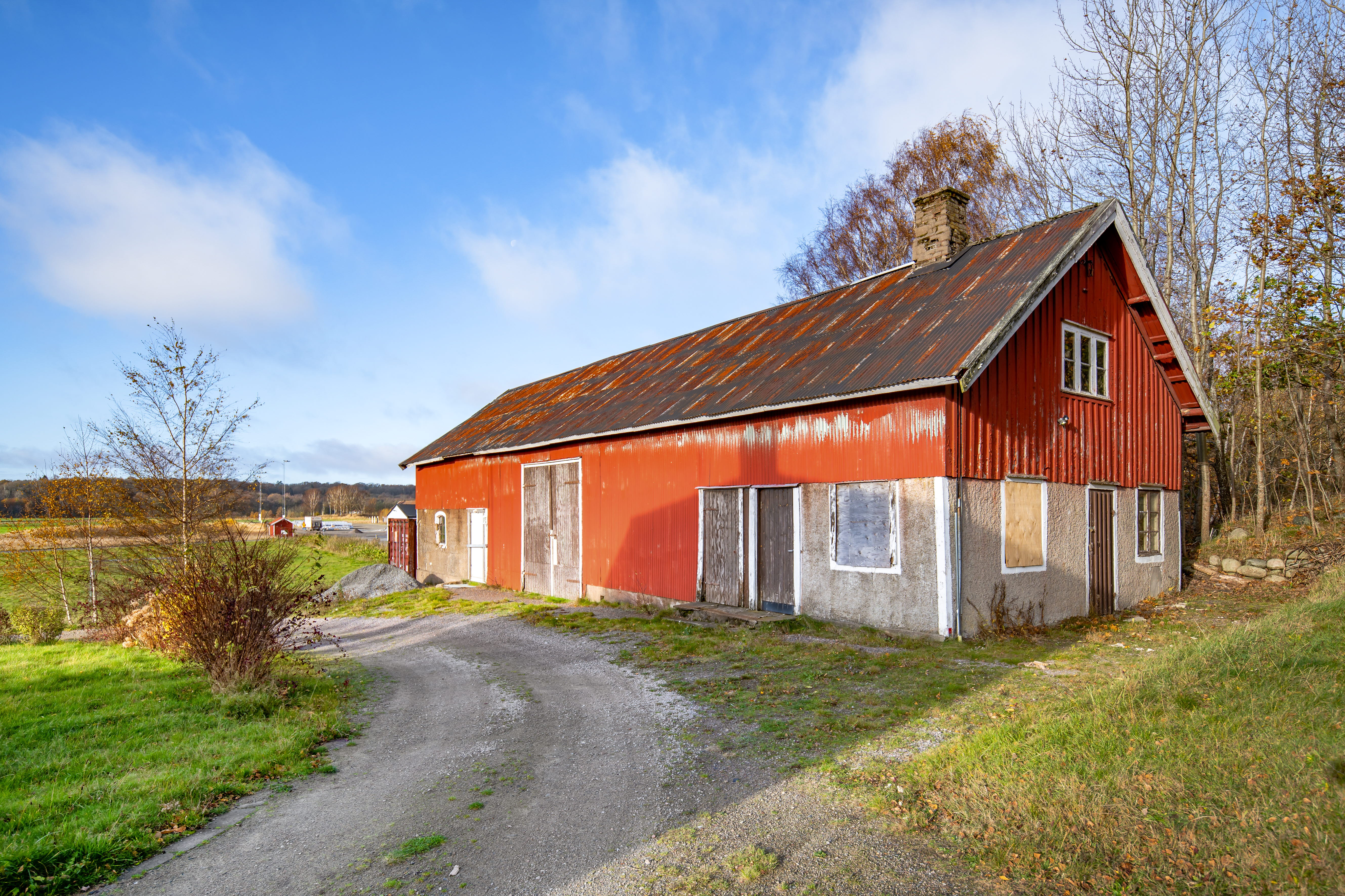 A small house on a dirt road