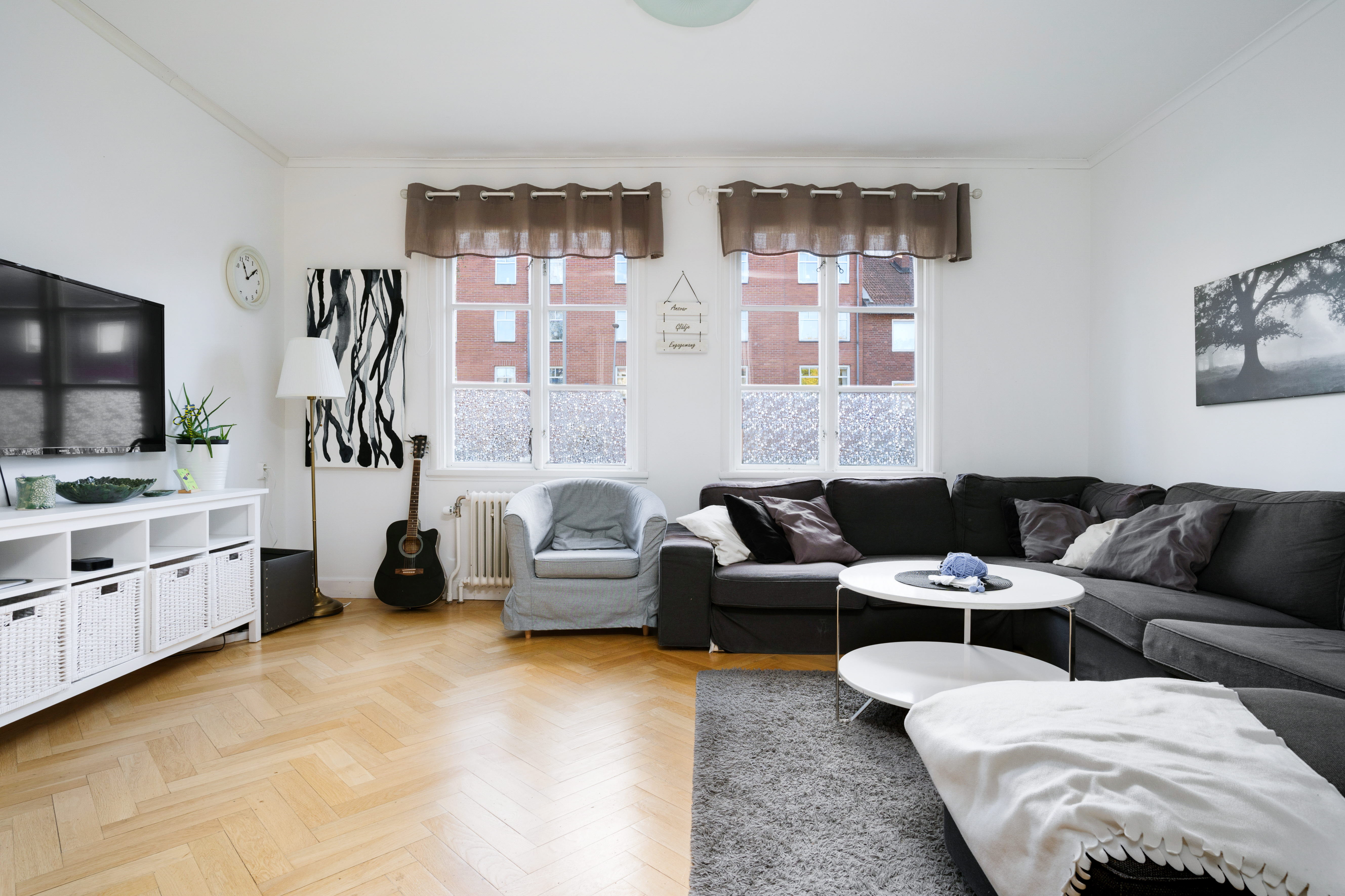 A living room filled with furniture and a fire place