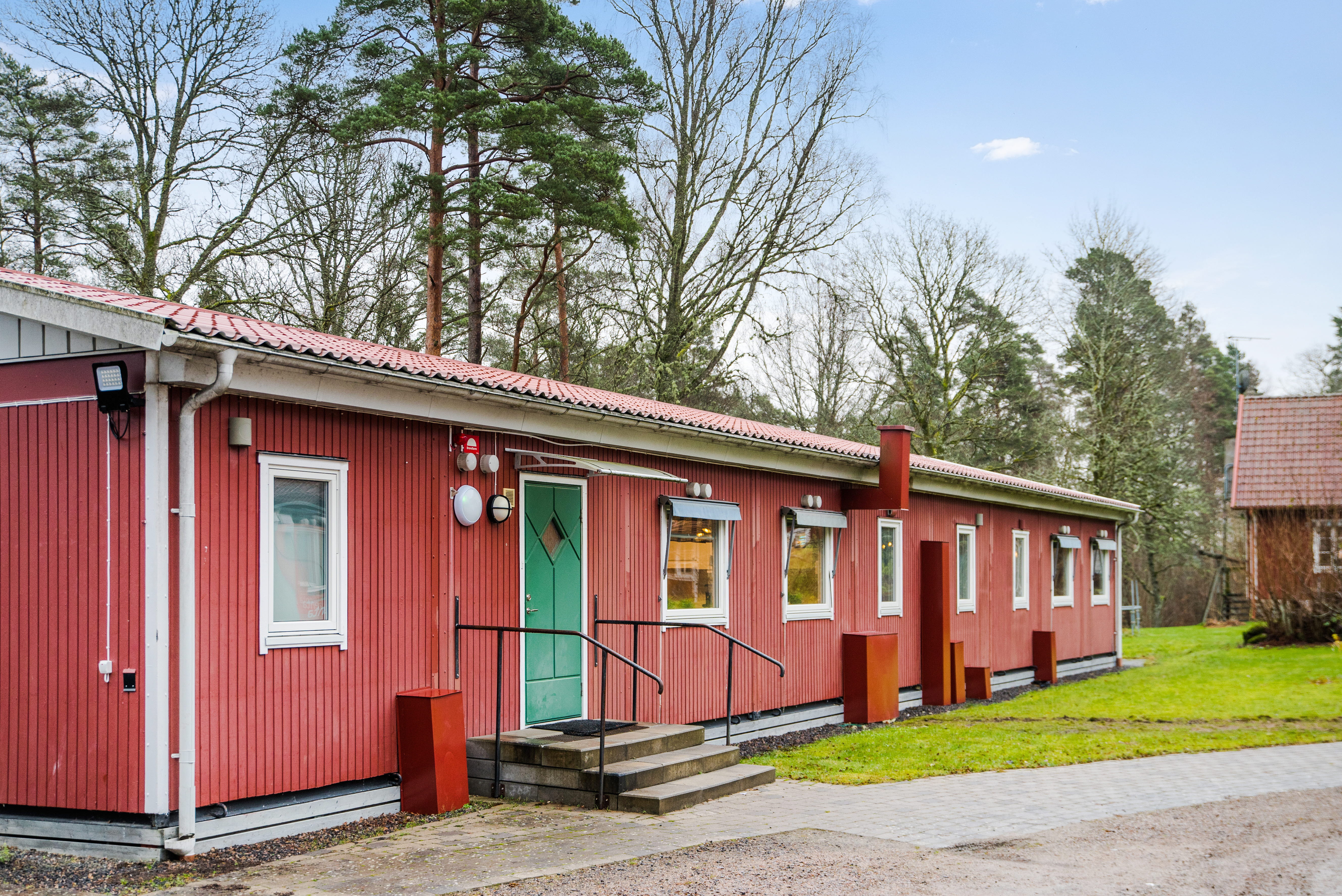 A house that is parked on the side of a building