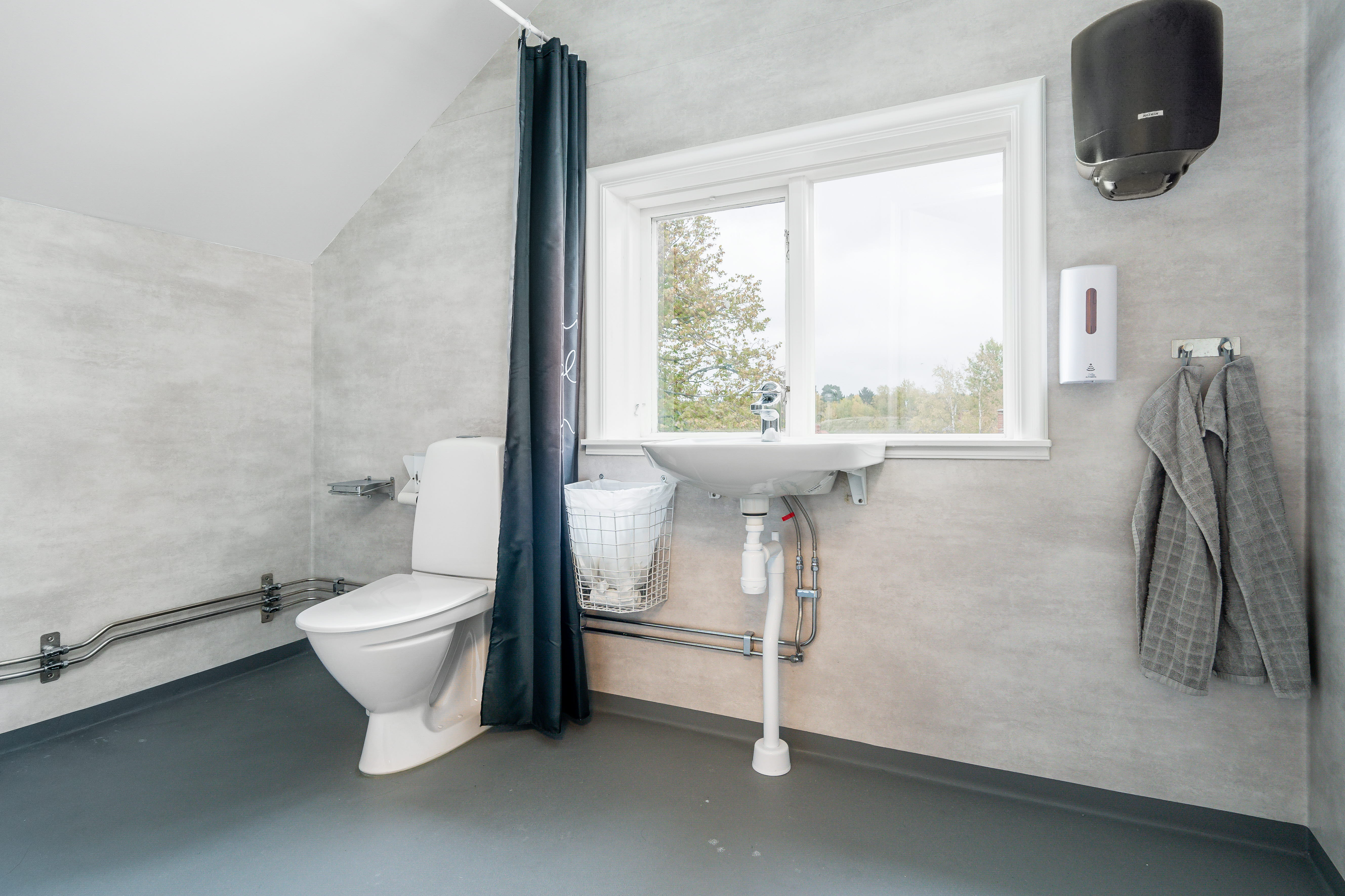 A room with a sink and a window