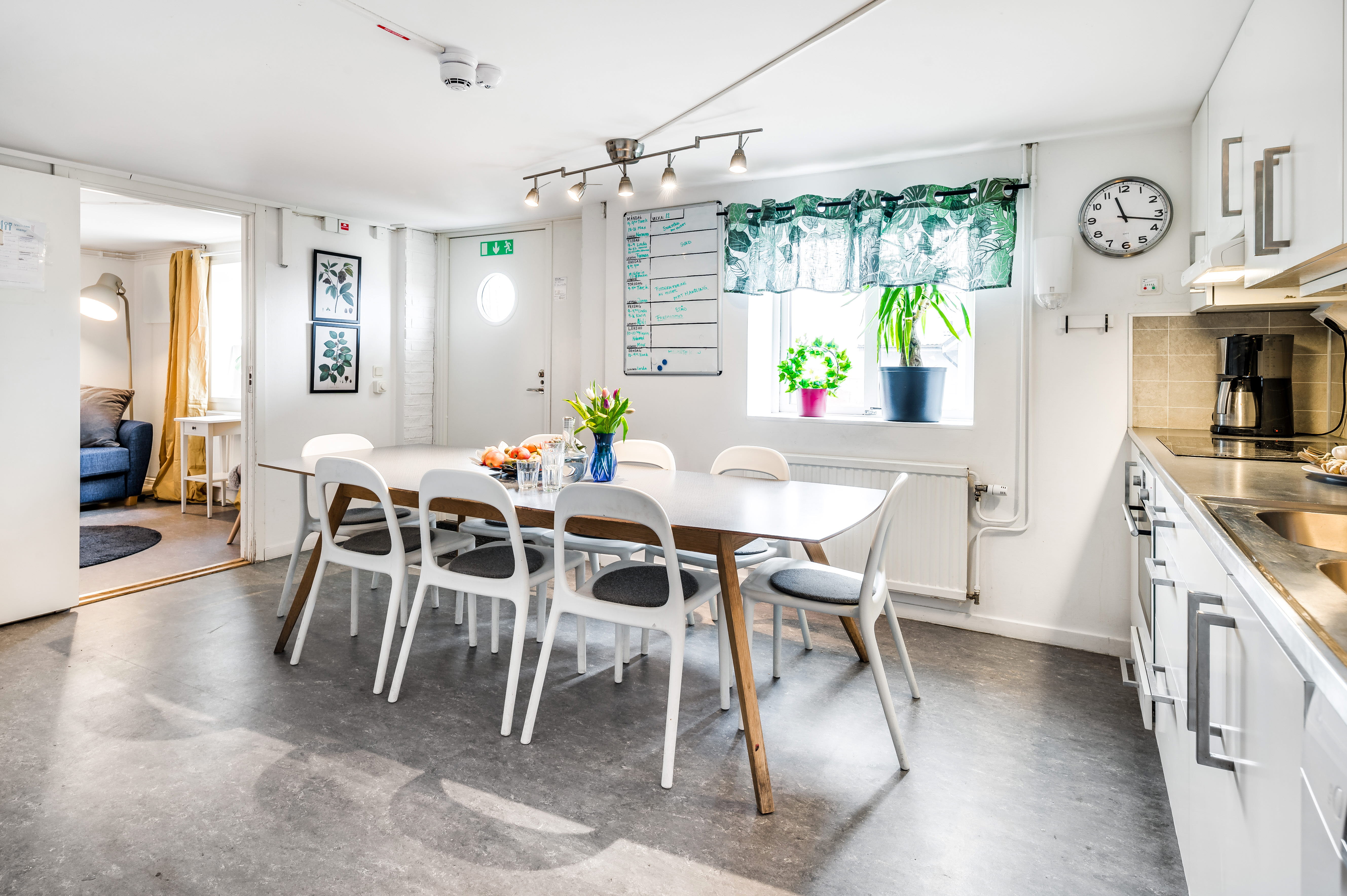 A kitchen with a dining room table