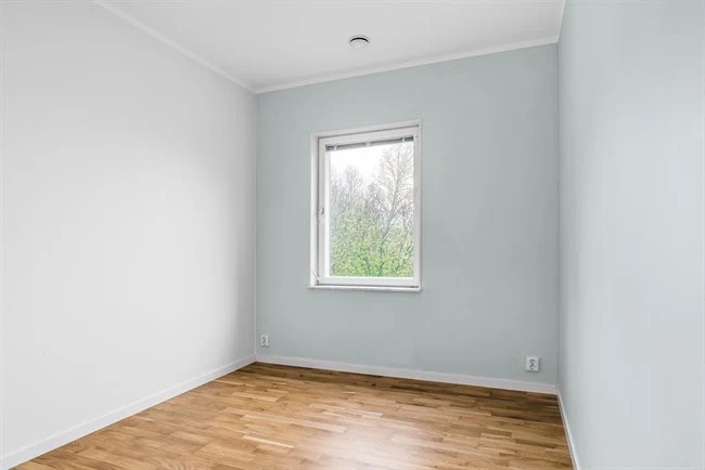 A room with a wood floor