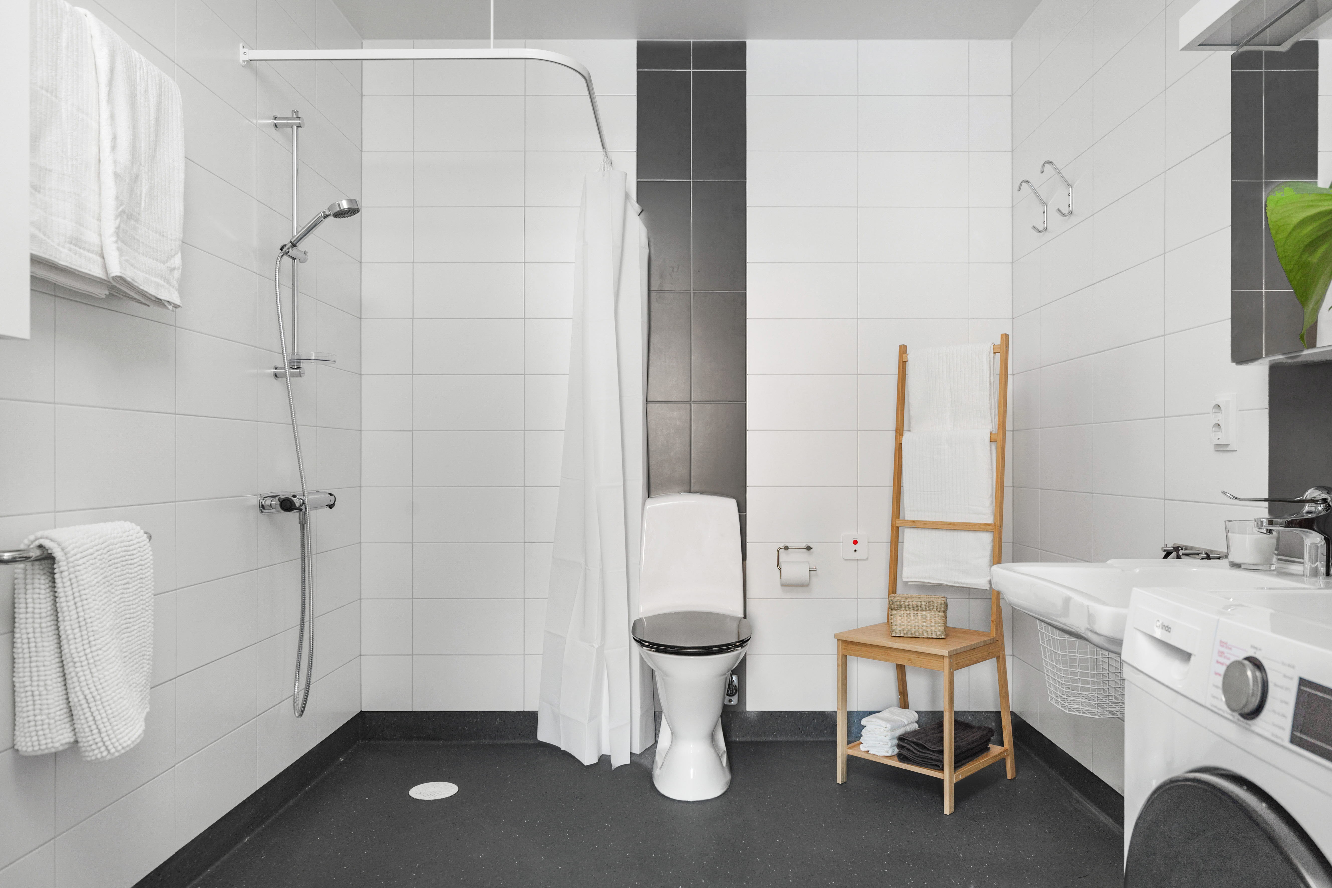 A room with a sink and a mirror
