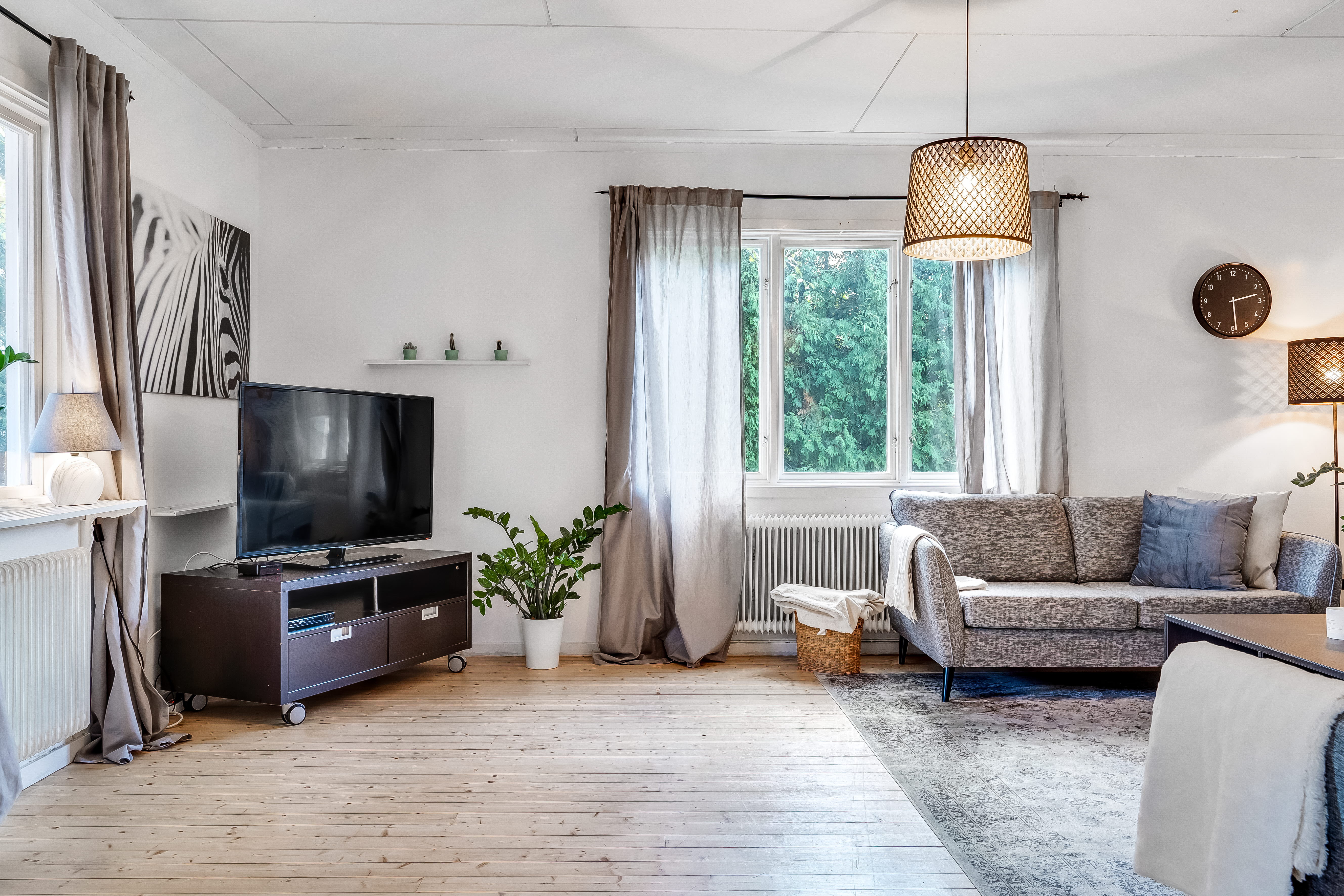 A living room filled with furniture and a fire place