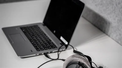 A laptop computer sitting on top of a table