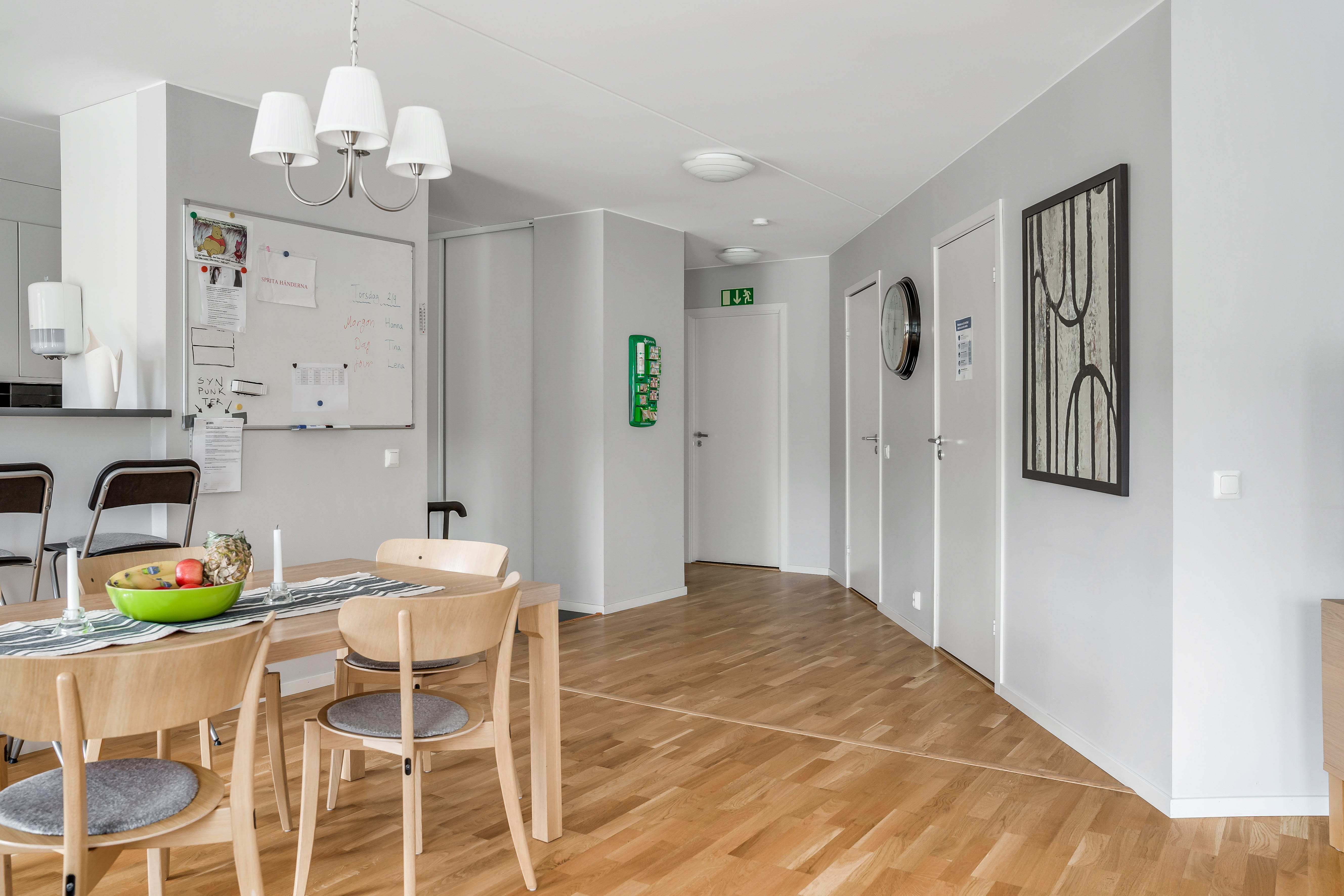 A kitchen with a dining room table