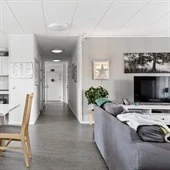 A living room filled with furniture and a table