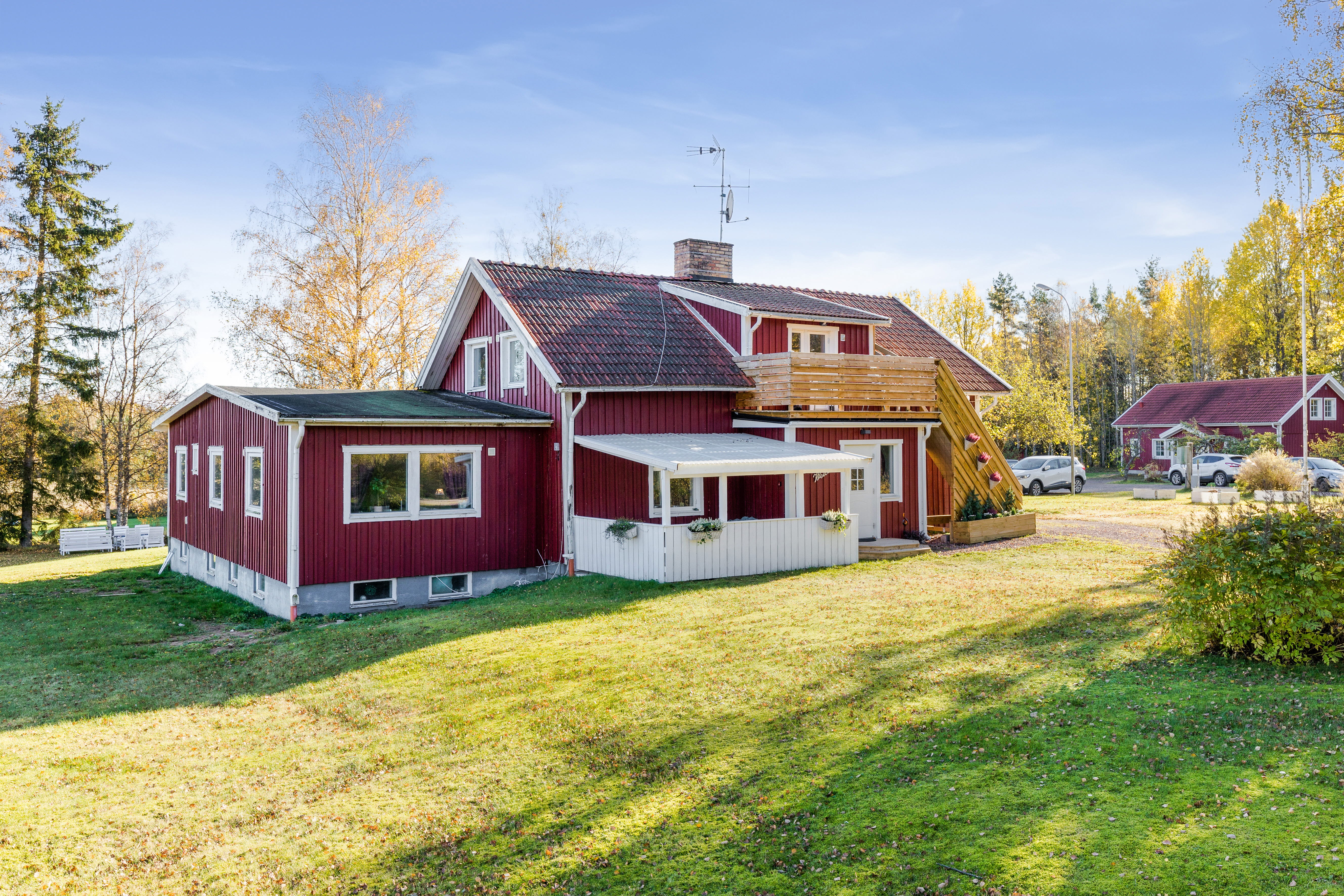 A small house in a grassy yard