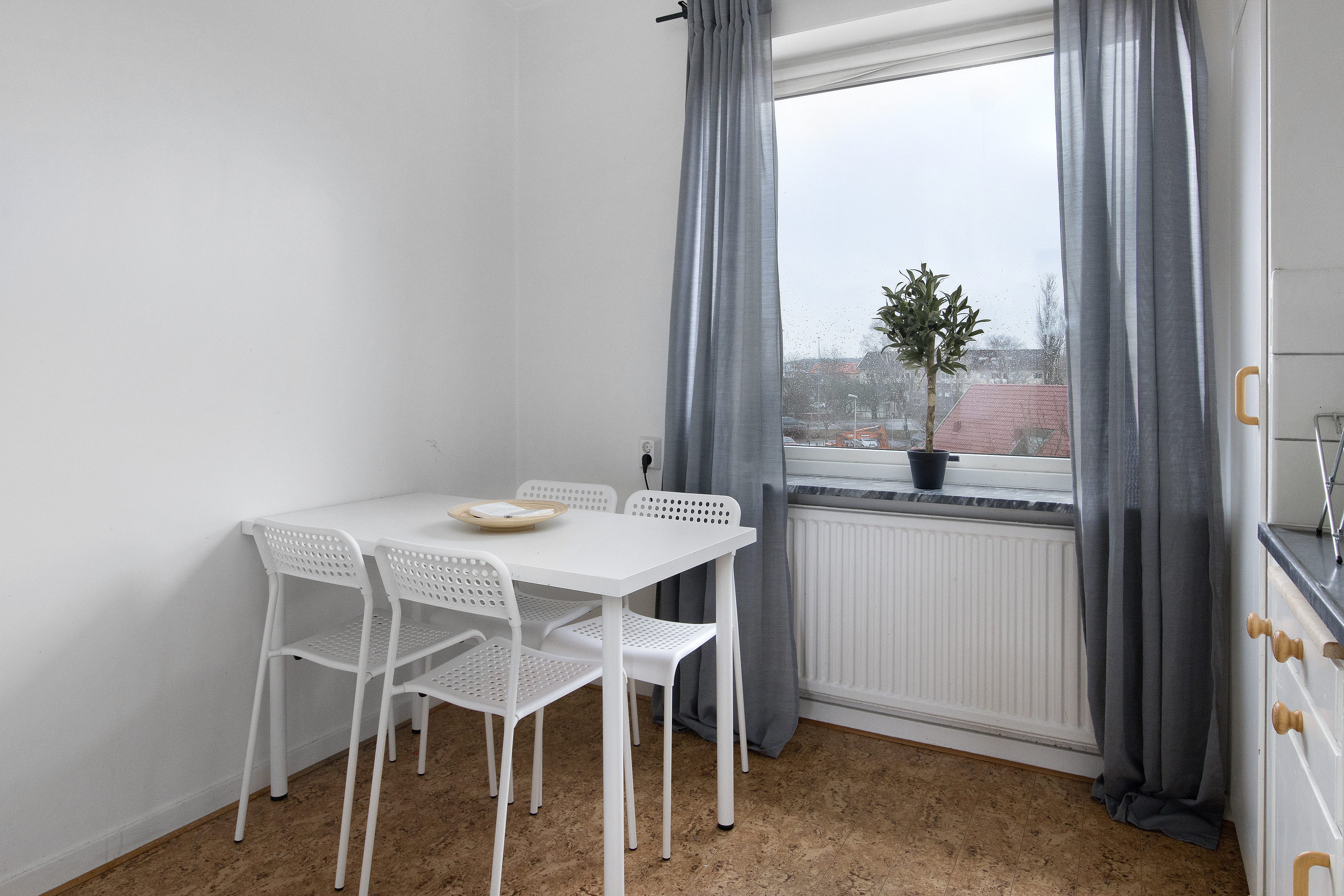 A bedroom with a large window